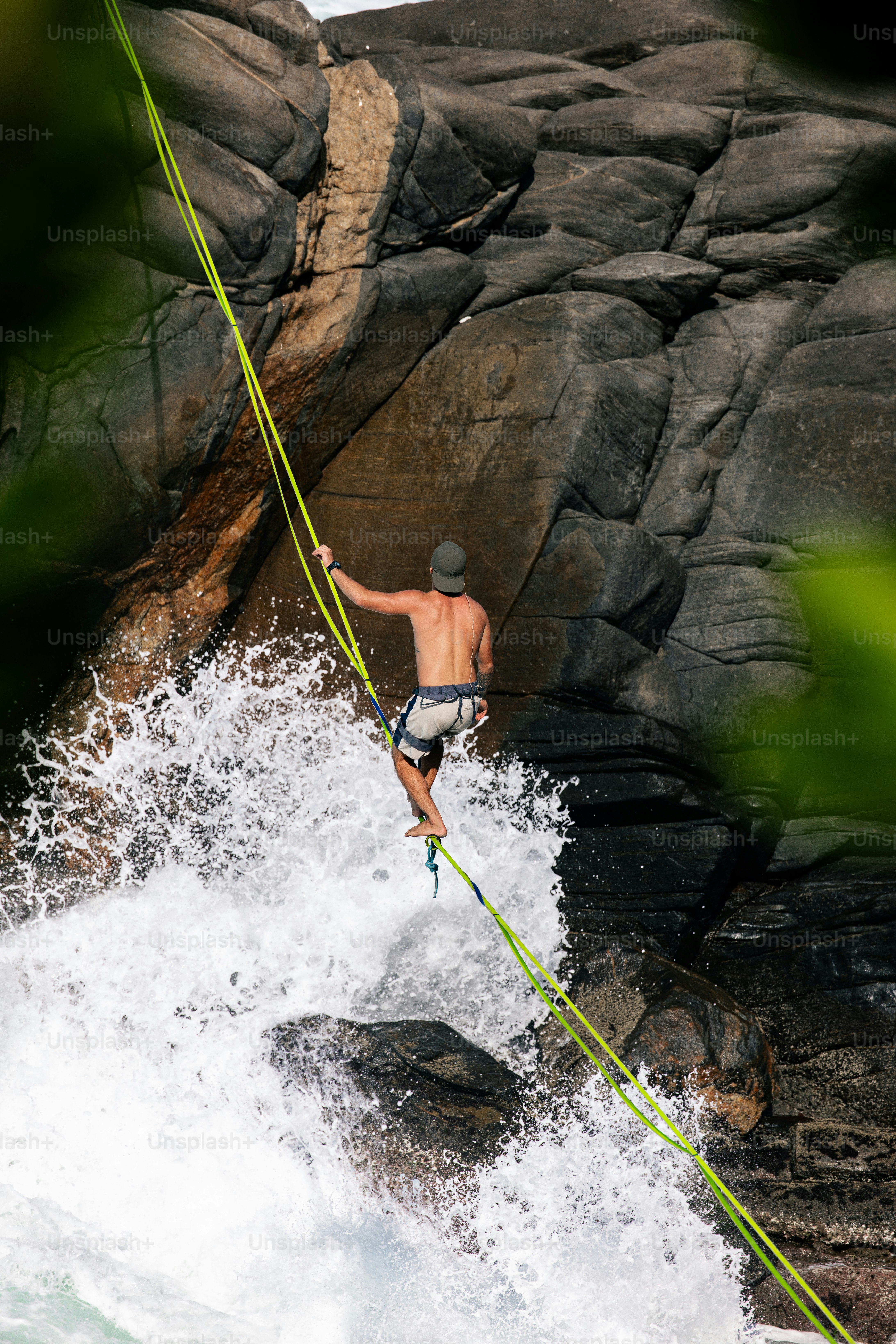 A man on a rope in the water