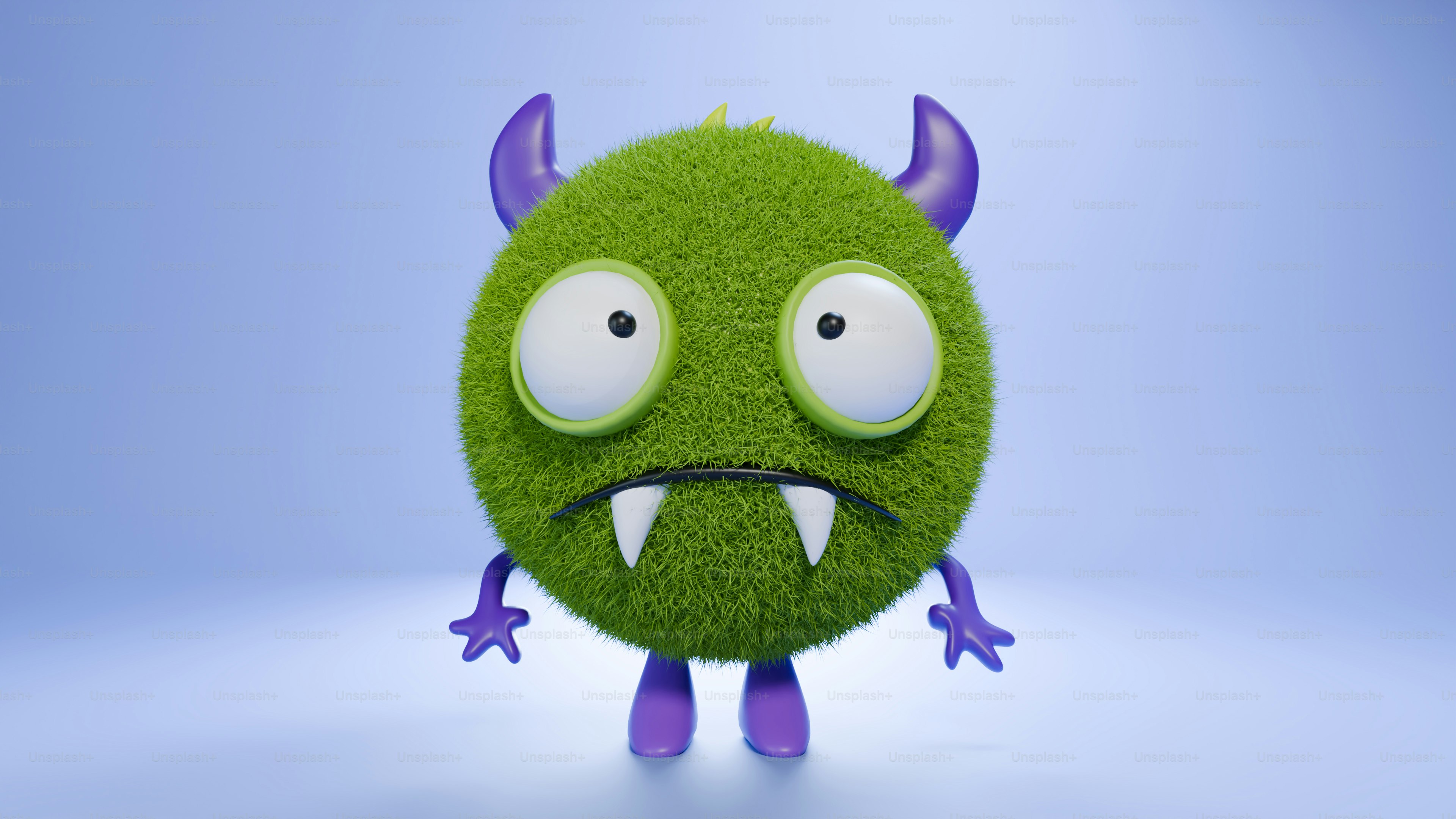 Ein grünes Monster mit Hörnern und großen Augen