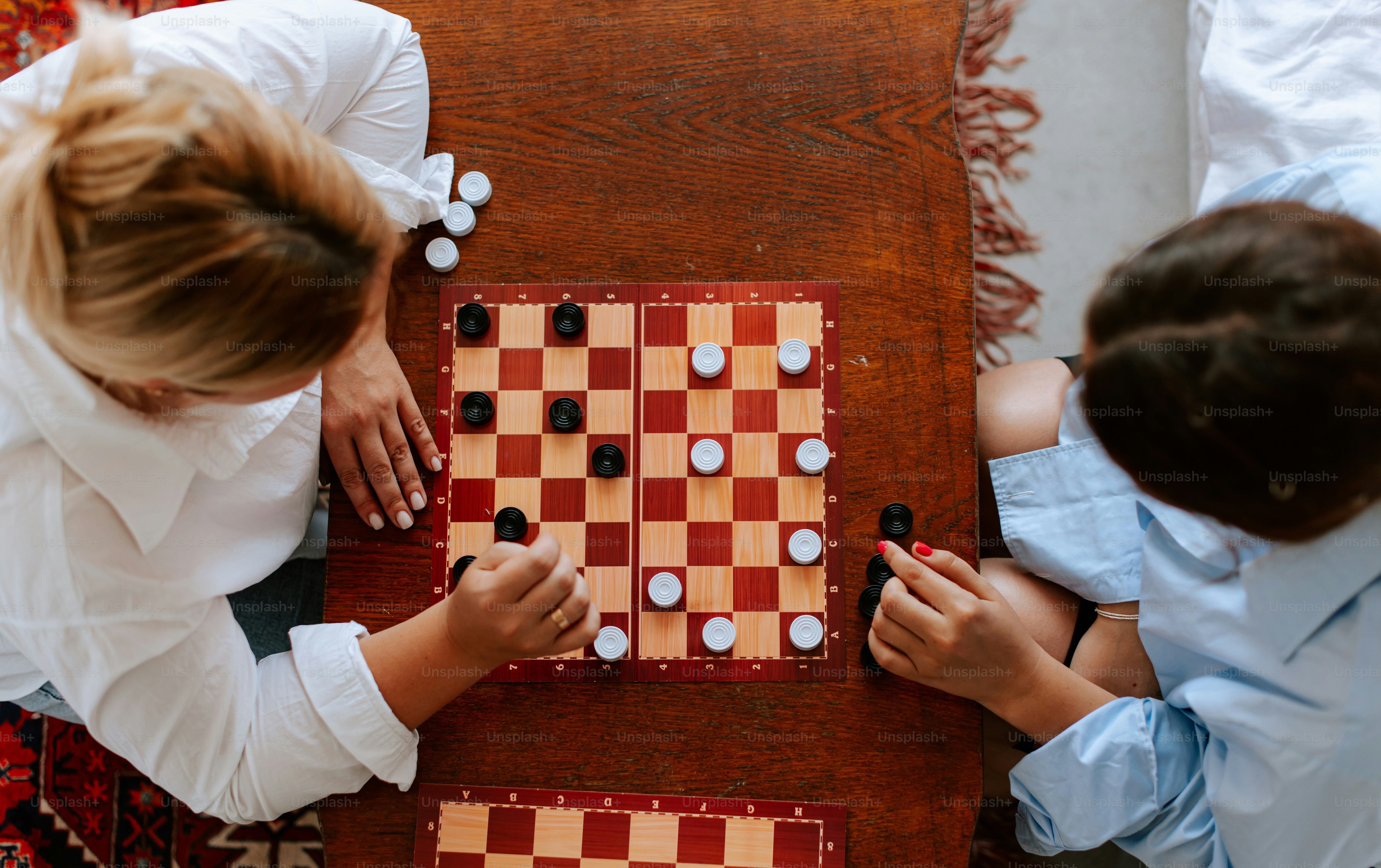 A couple of people playing a game of chess