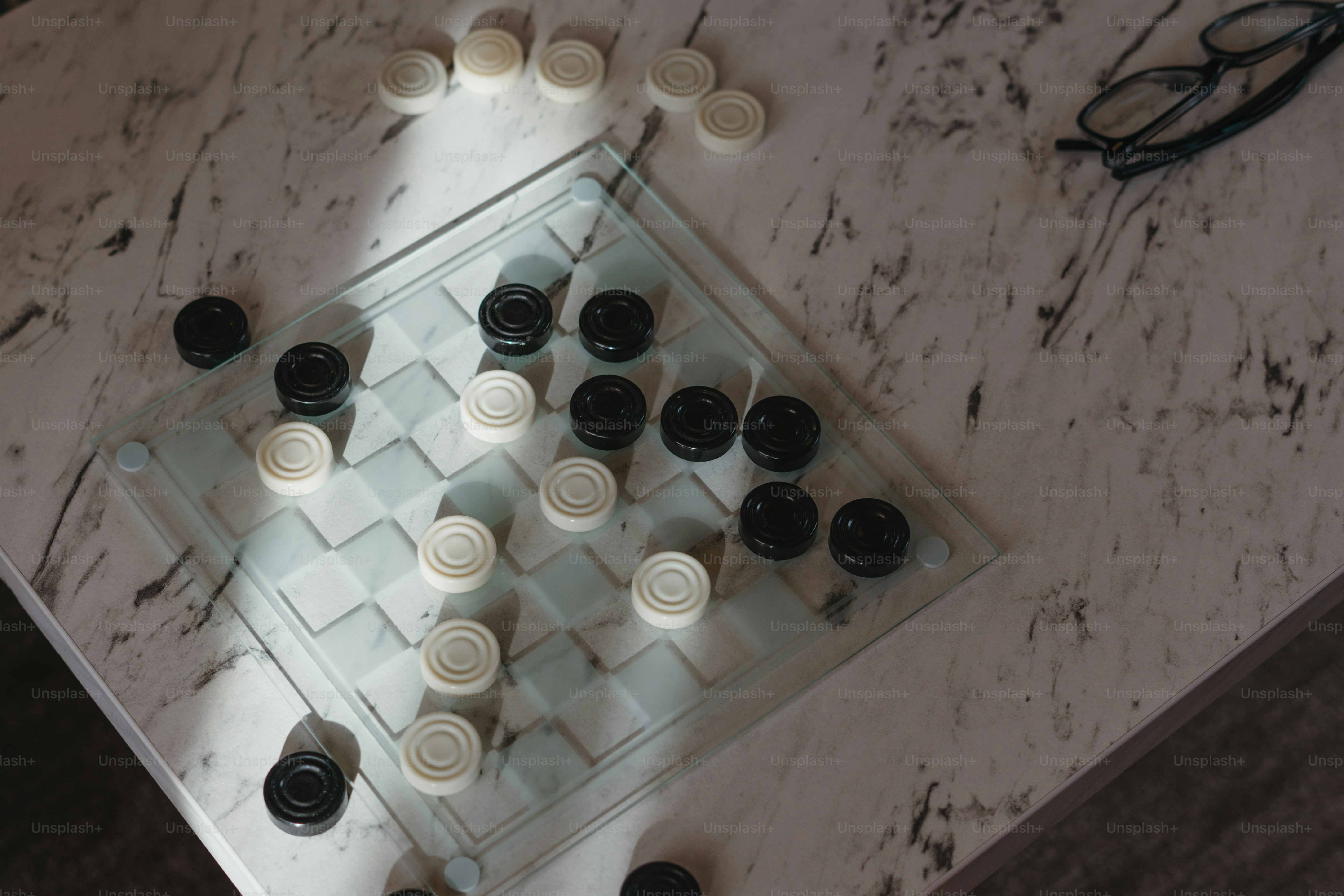 A close up of a chess board on a table