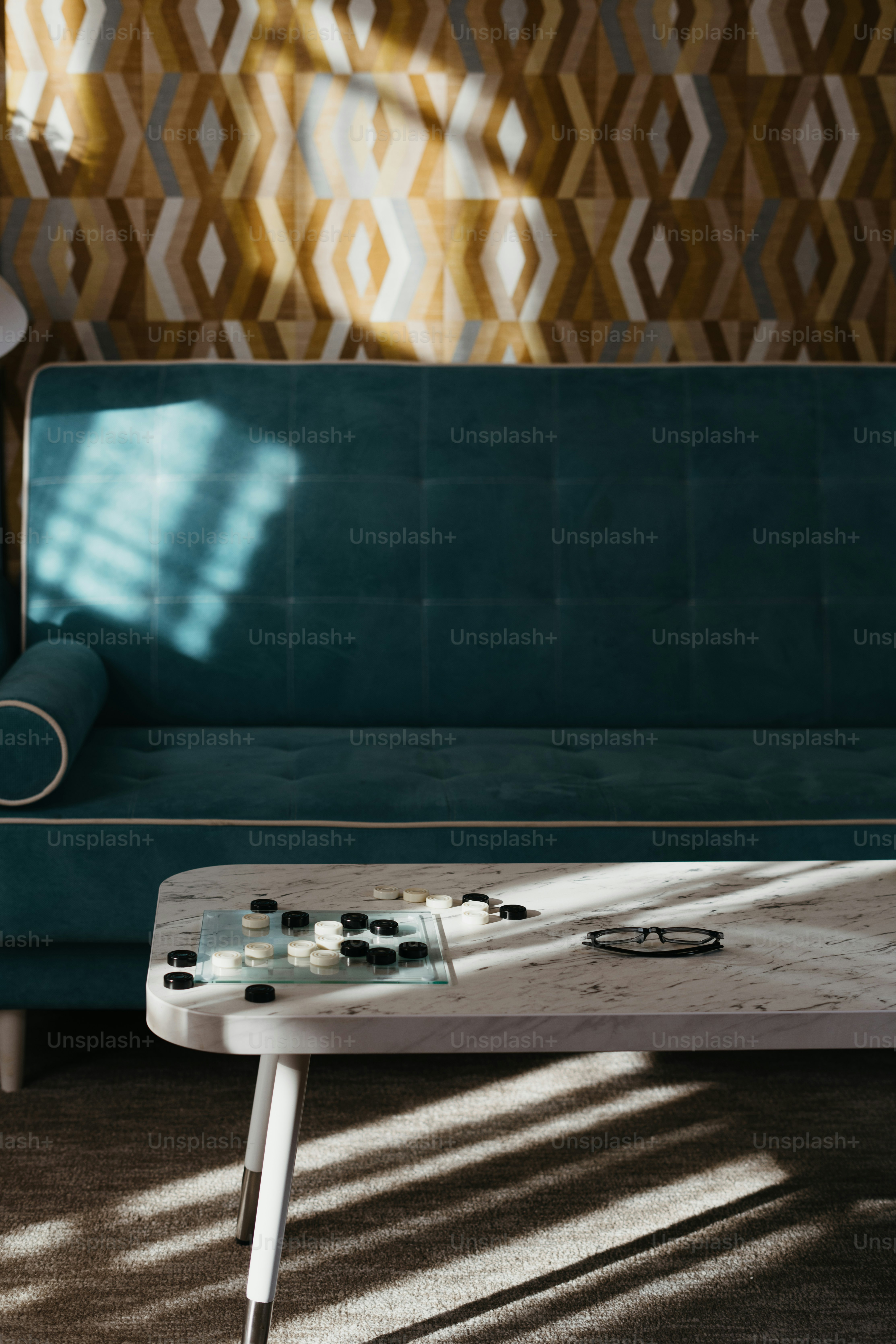 A white table with a bunch of beads on it photo – Checkers Image on ...