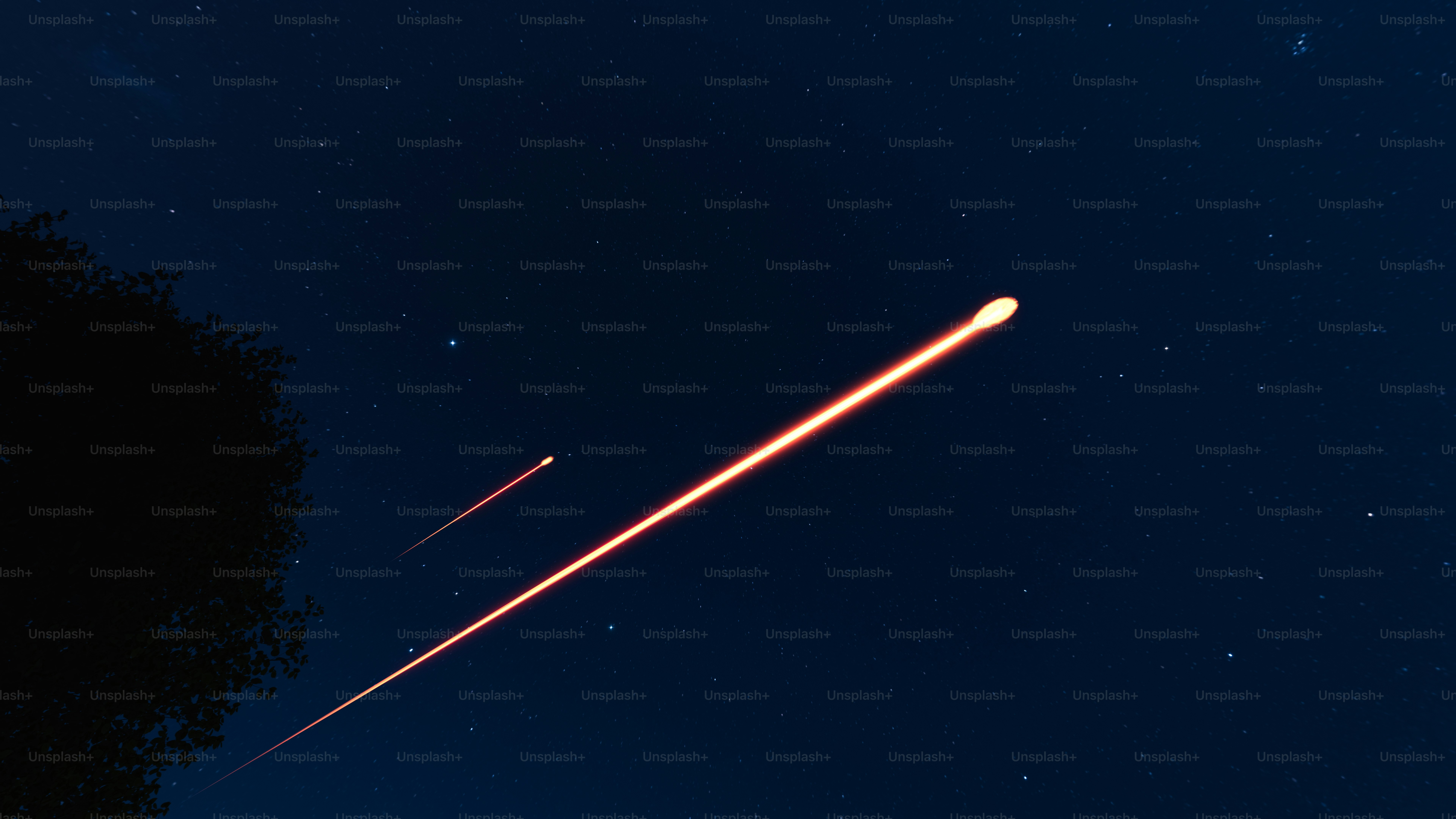 An airplane is flying in the night sky