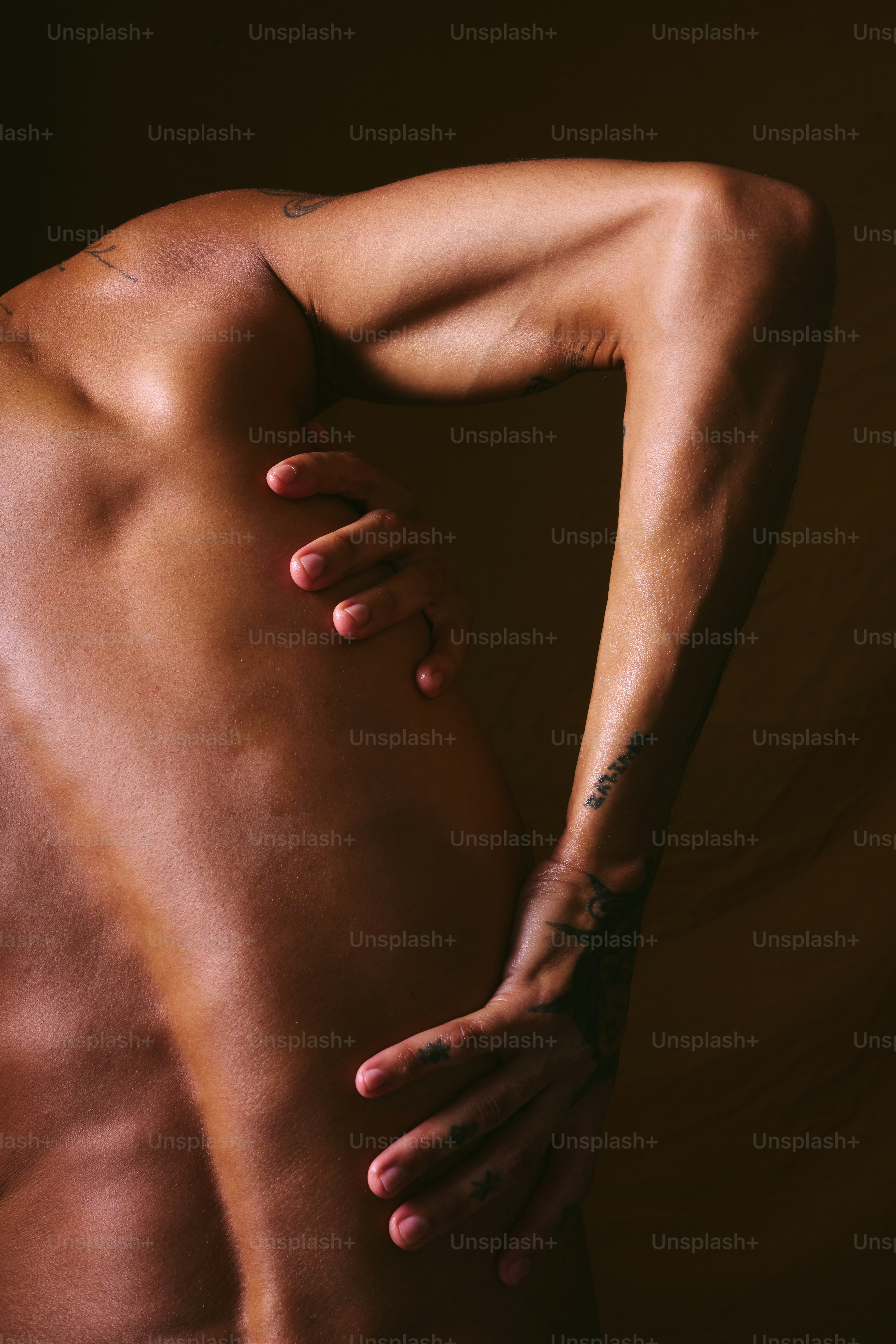 A man with his back turned to the camera