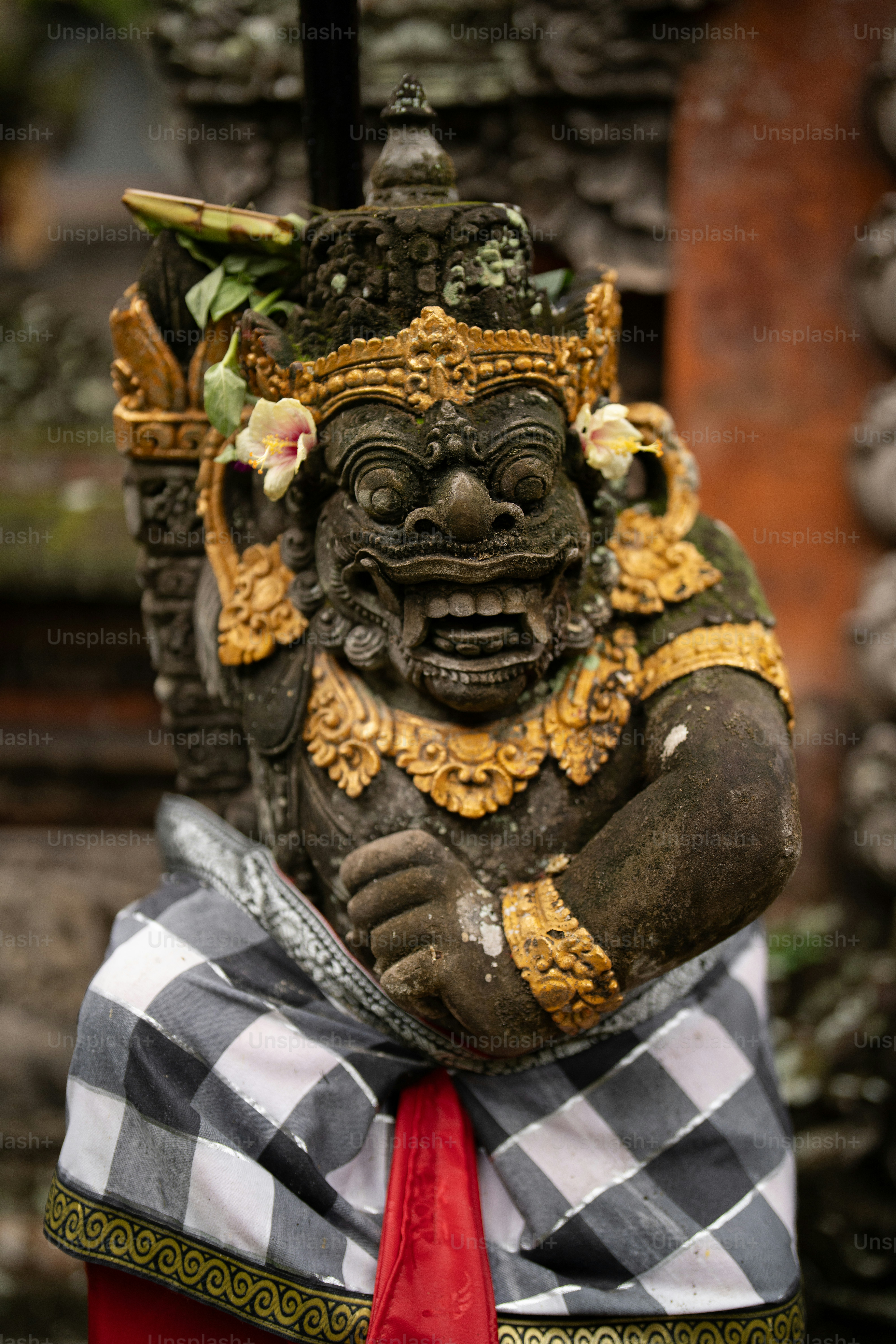 A statue of a person with a red tie