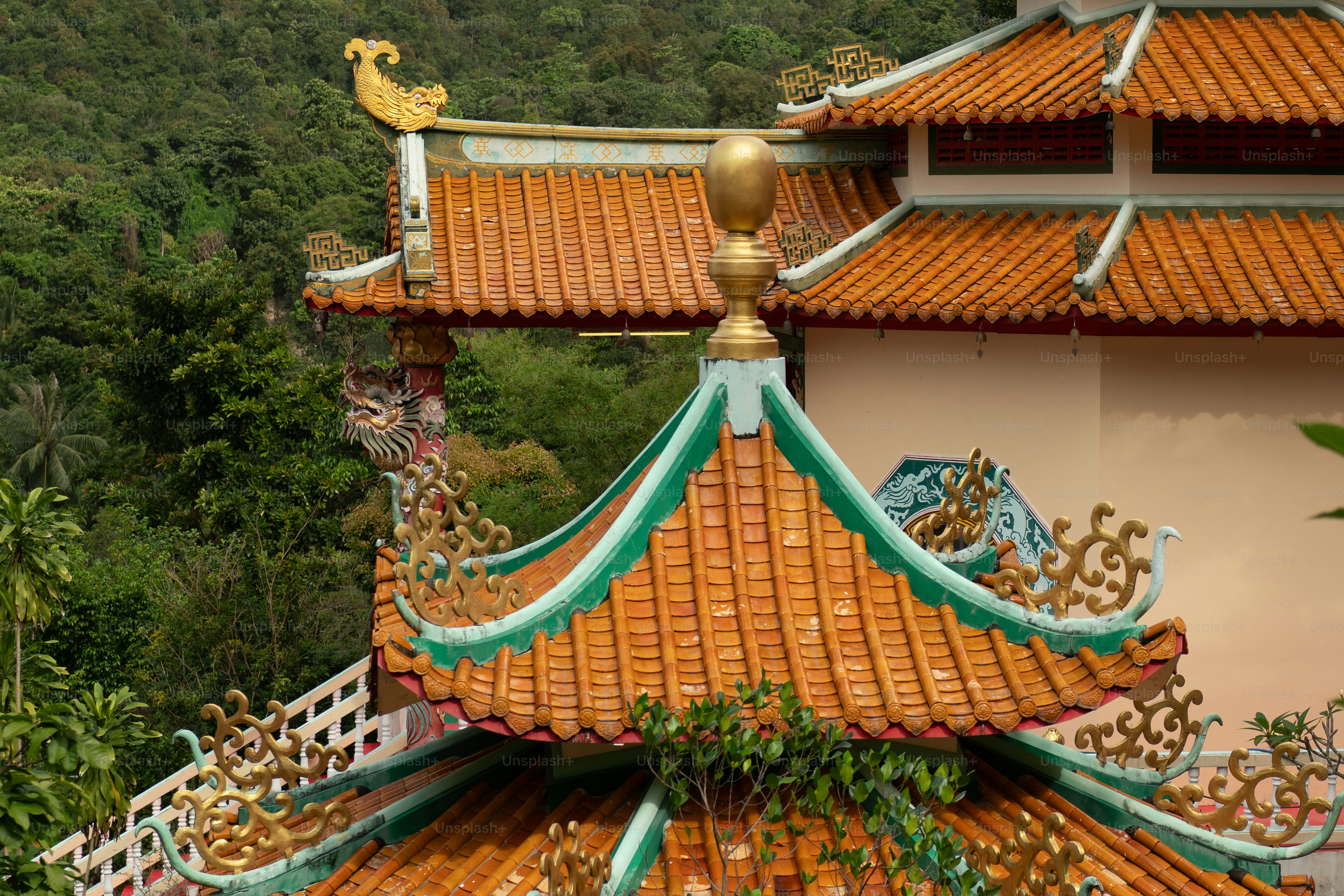 The roof of a building with a bird on top of it