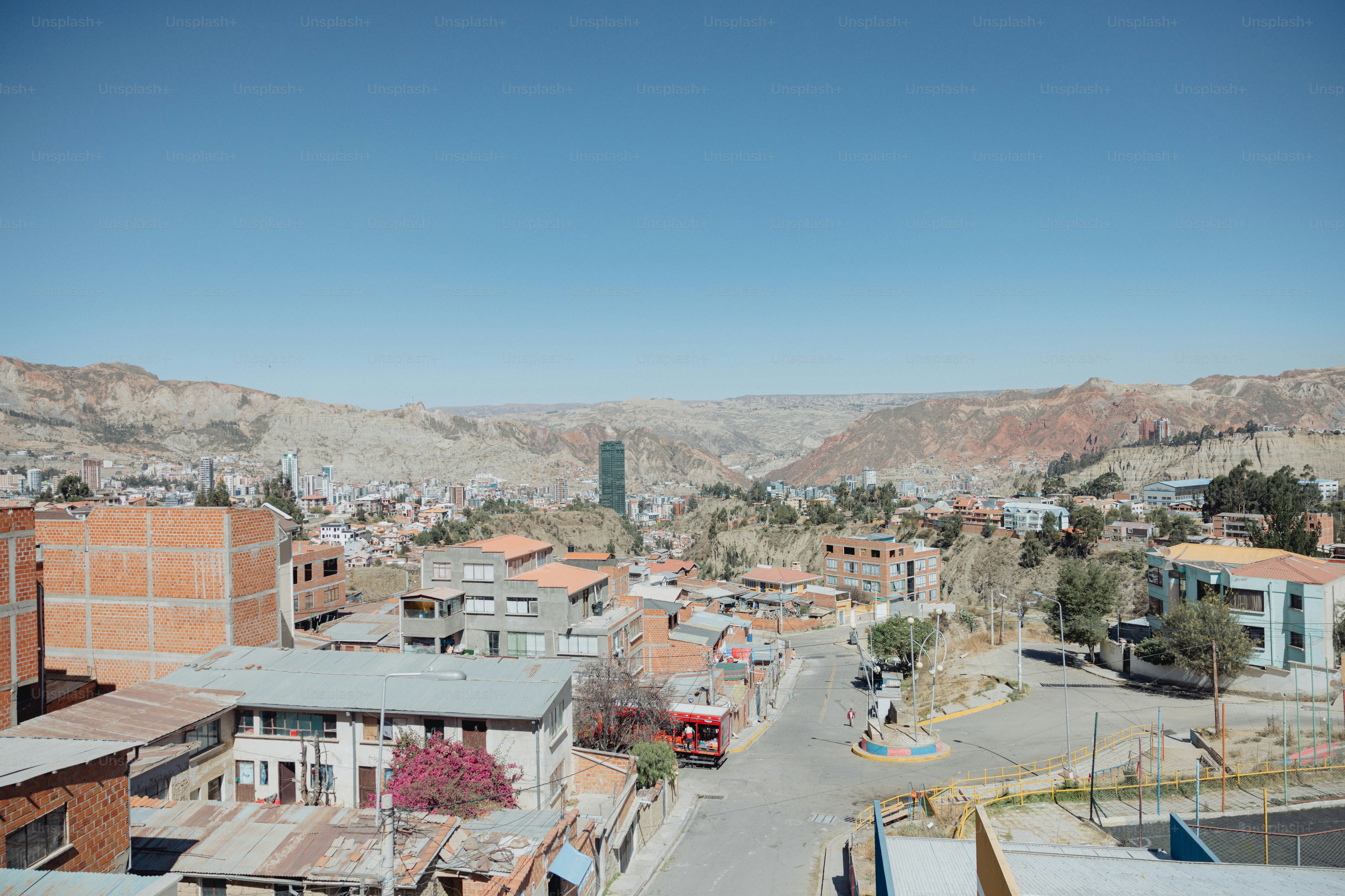 A view of a city with mountains in the background