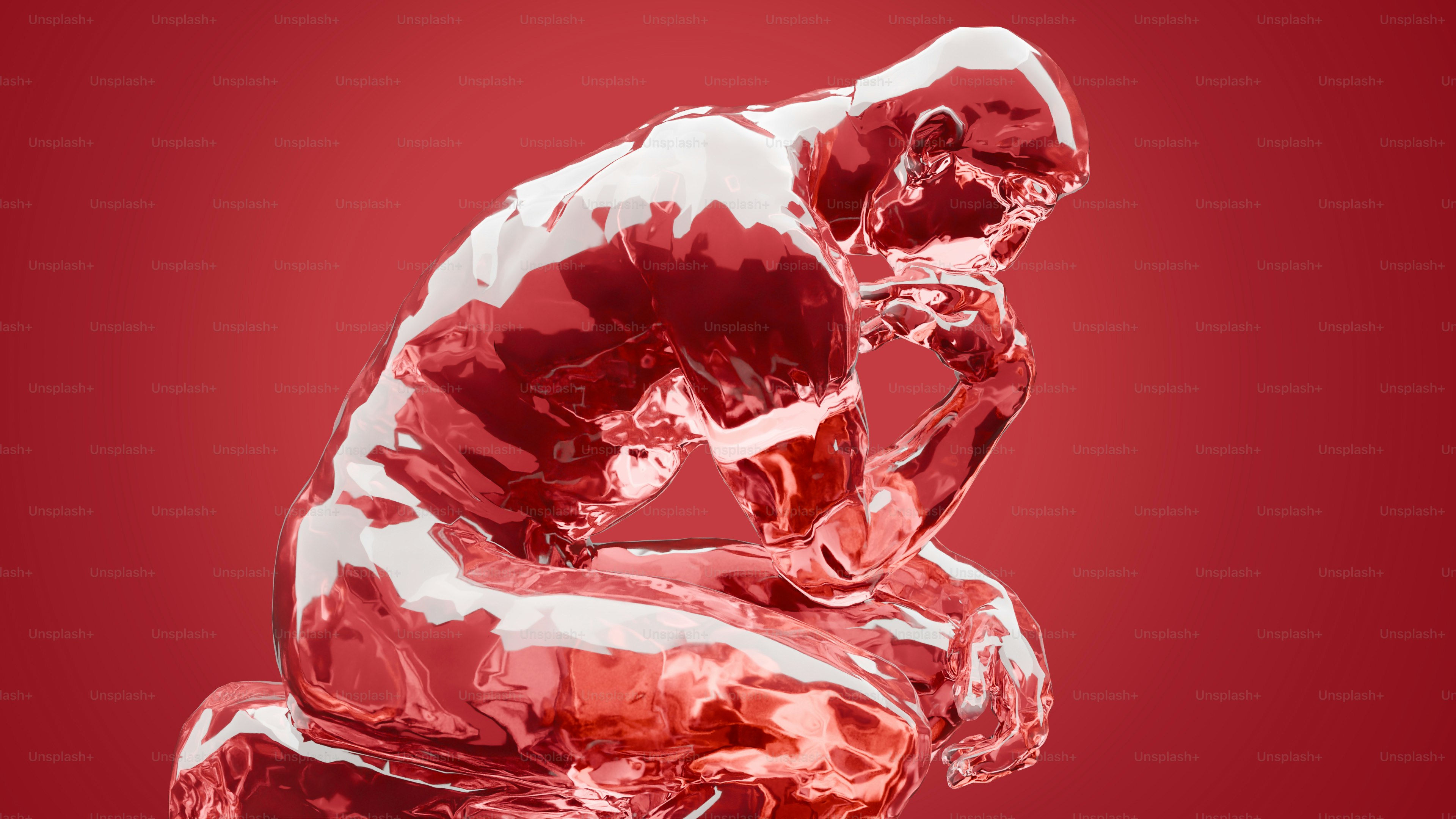 A glass sculpture of a person sitting on a stool