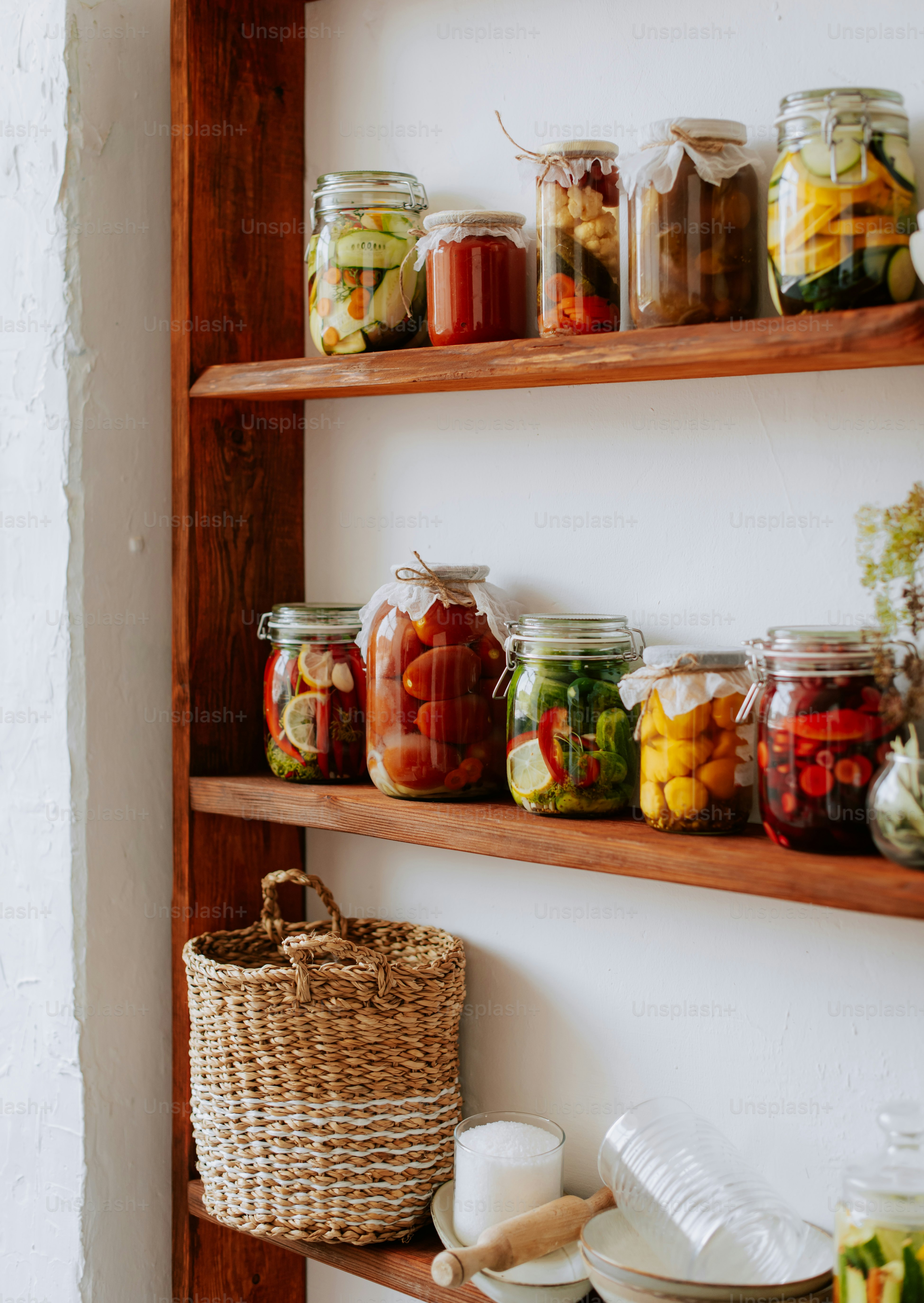 Weekly kitchen cleaning routine with neatly organized pantry shelves and labeled containers.