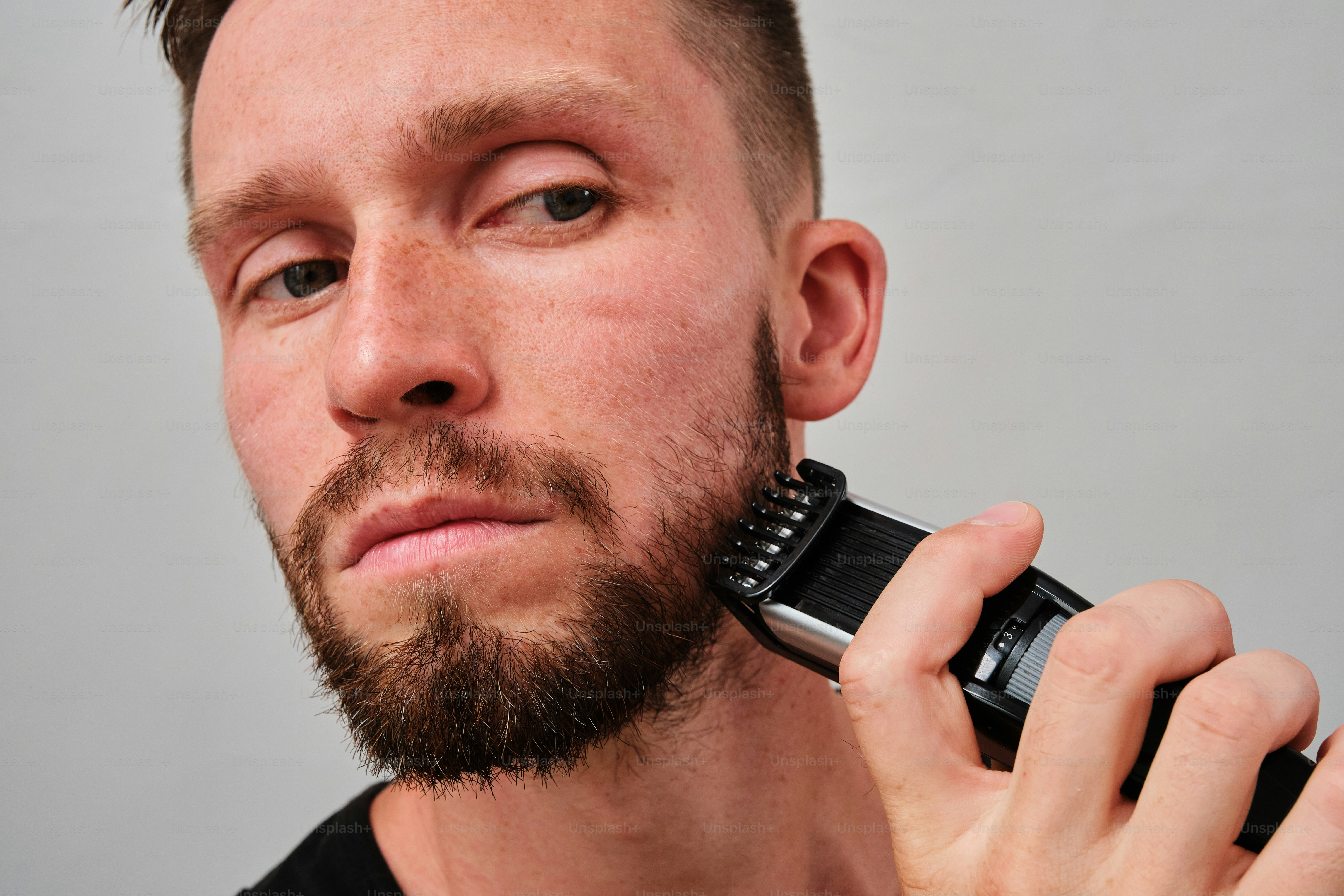 A man holding a cell phone to his ear