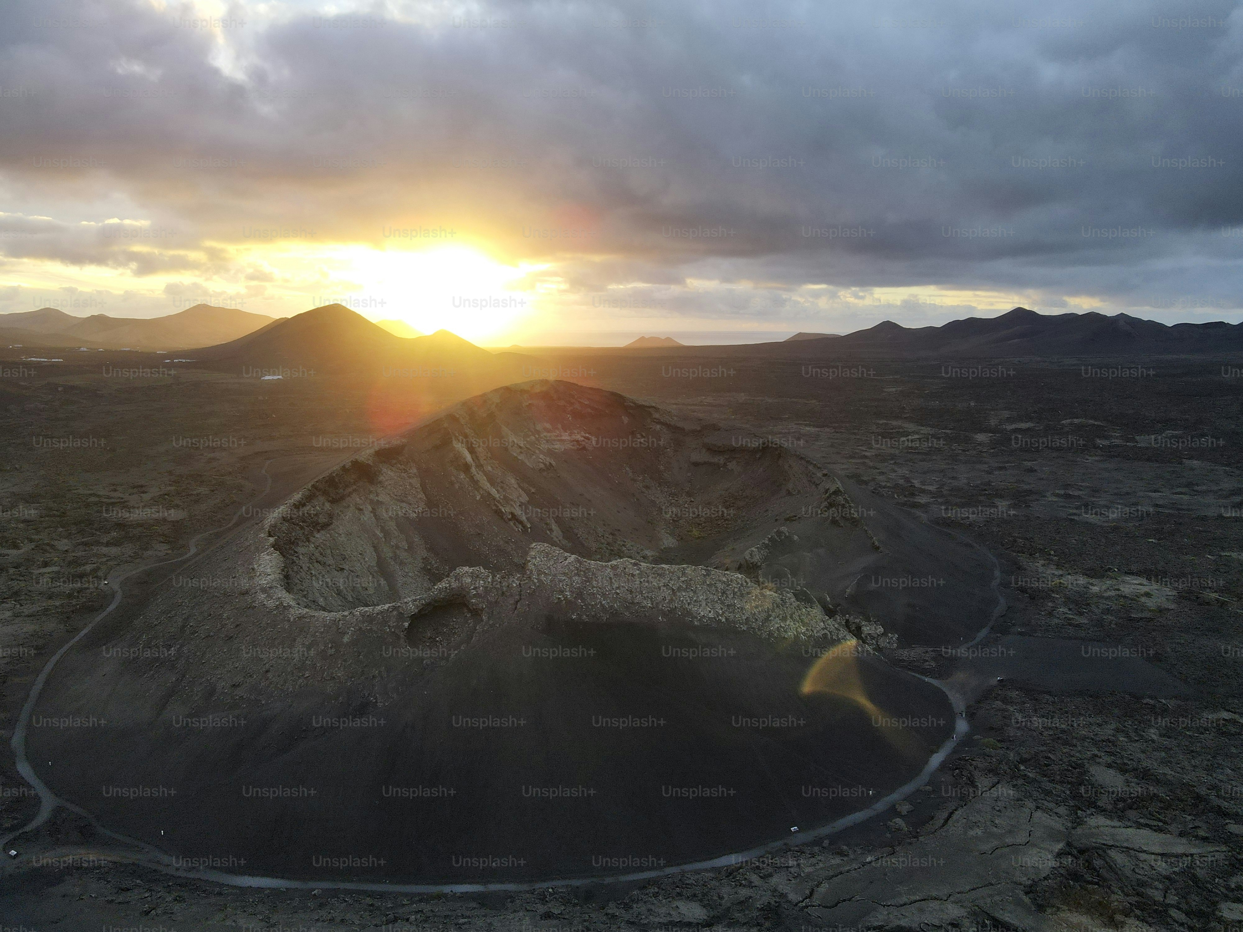 A large crater in the middle of a desert