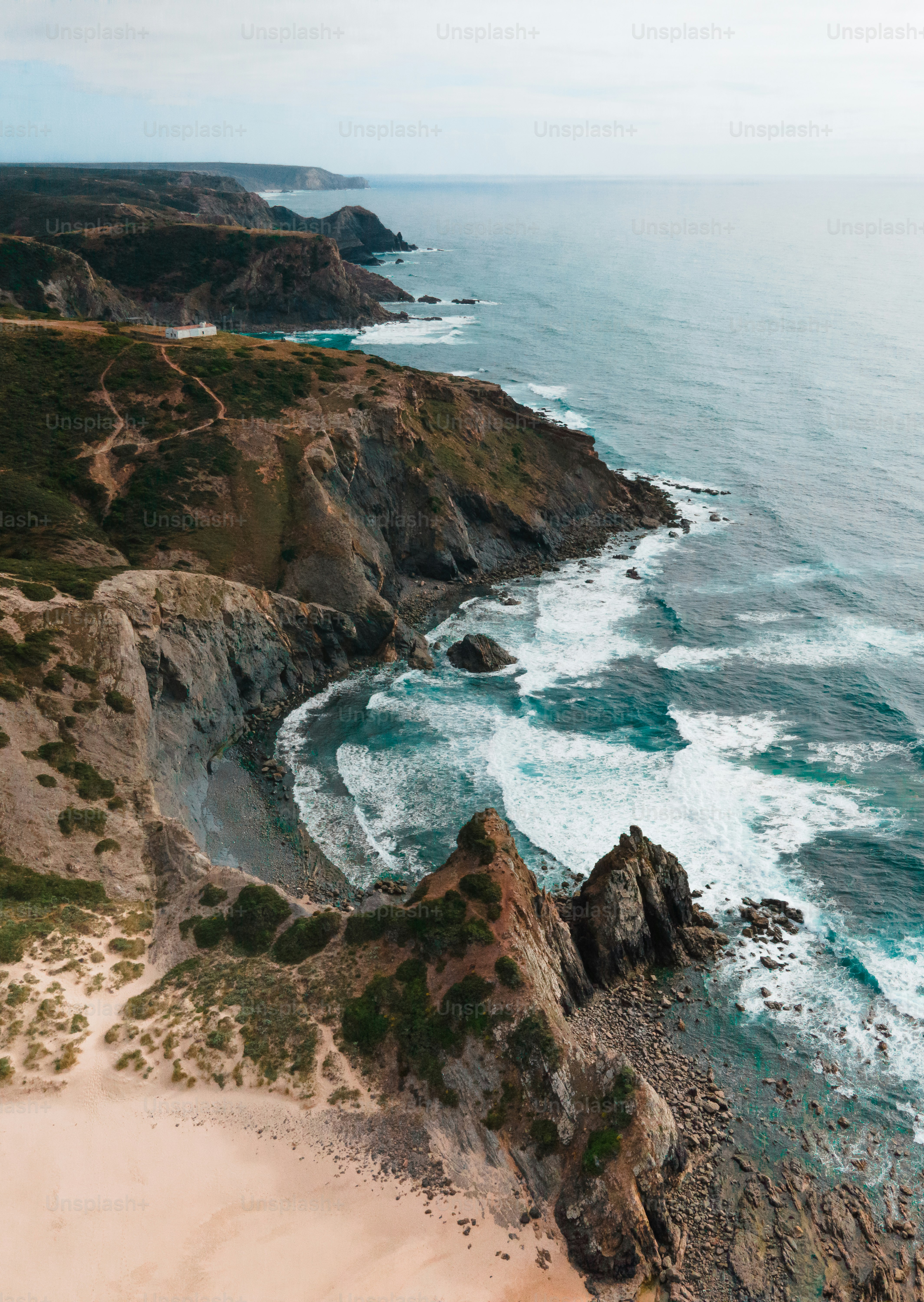 An aerial view of a beach and the ocean
