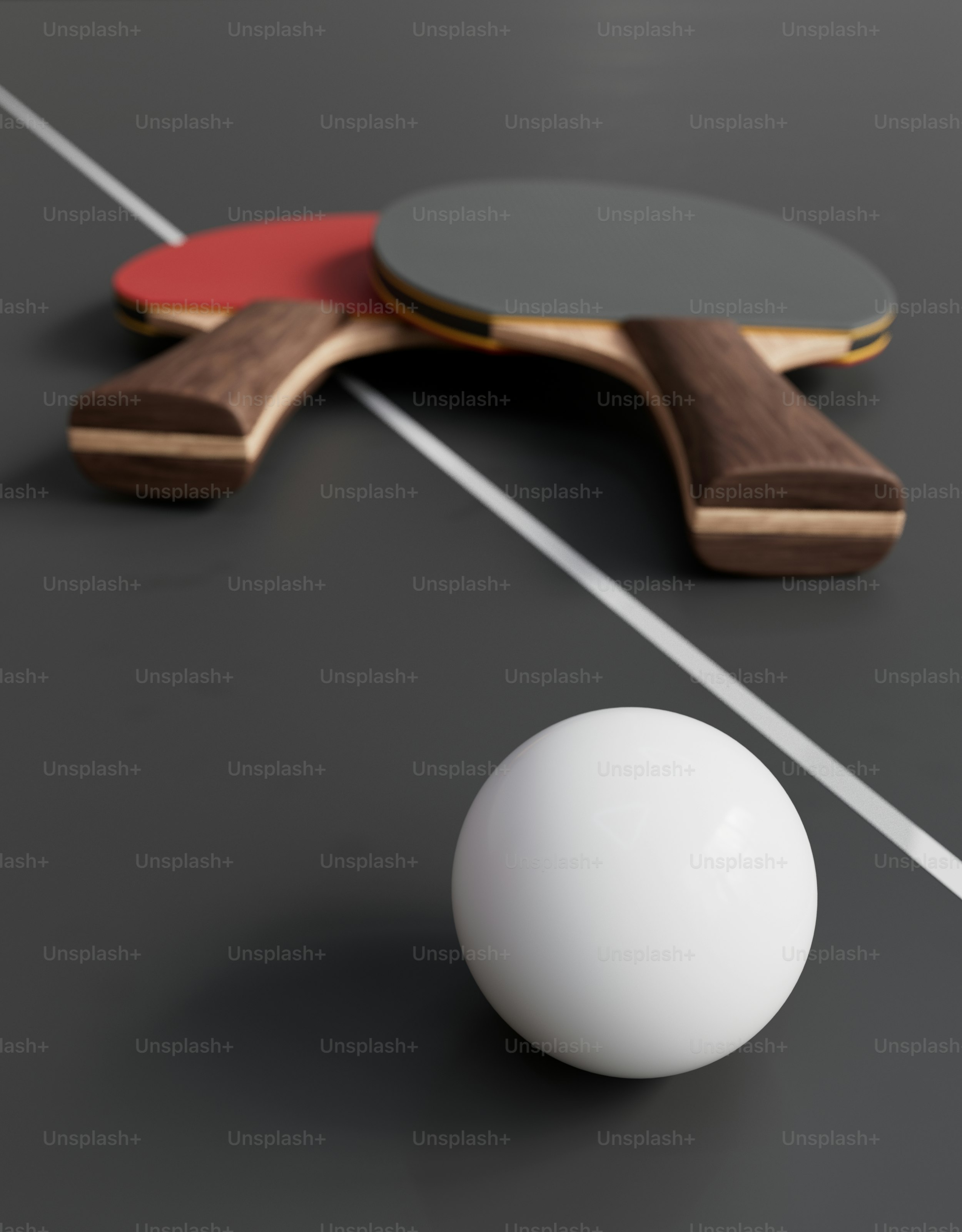 A ping pong paddle next to a ping pong ball