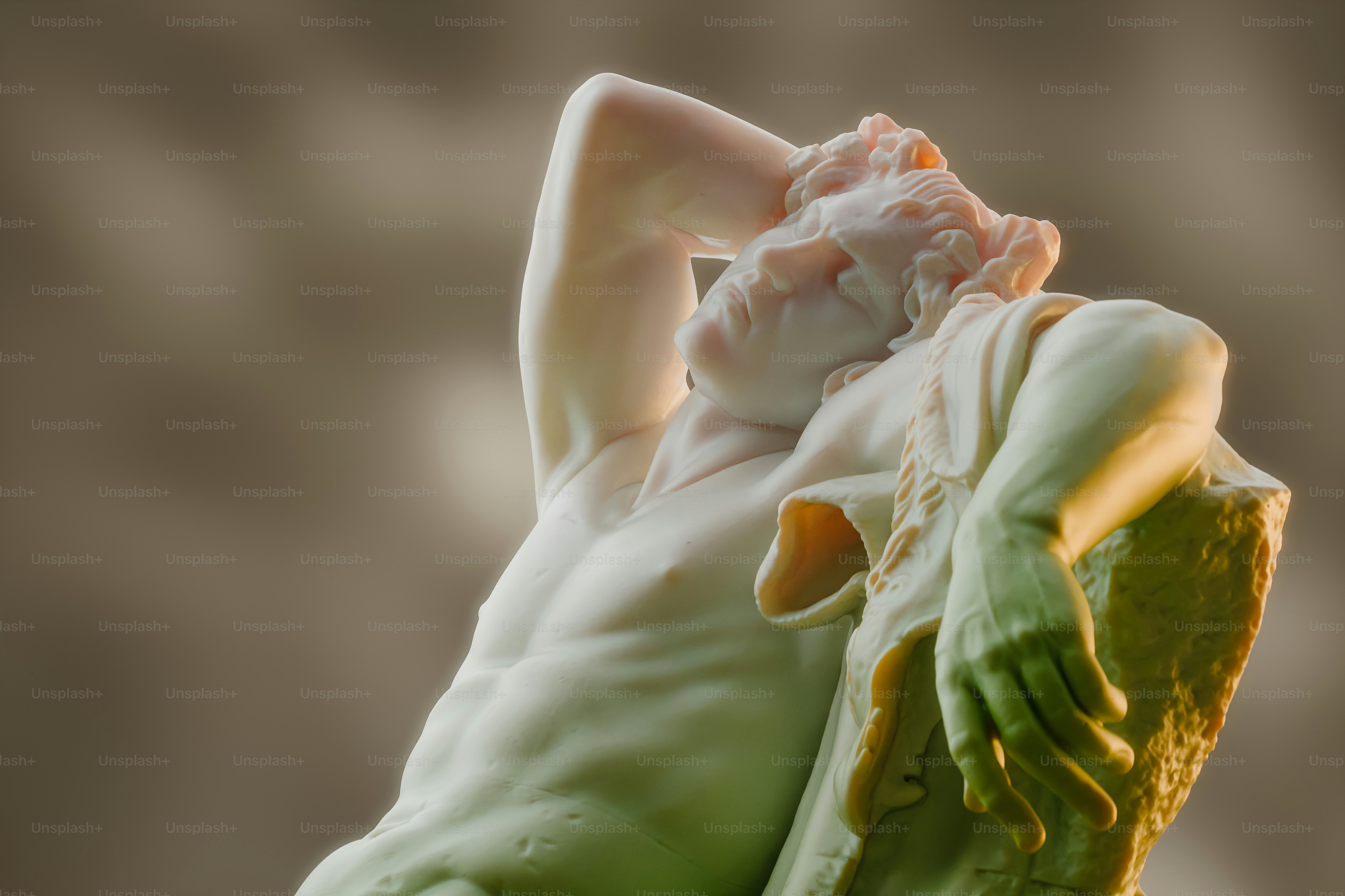 A close up of a statue of a woman