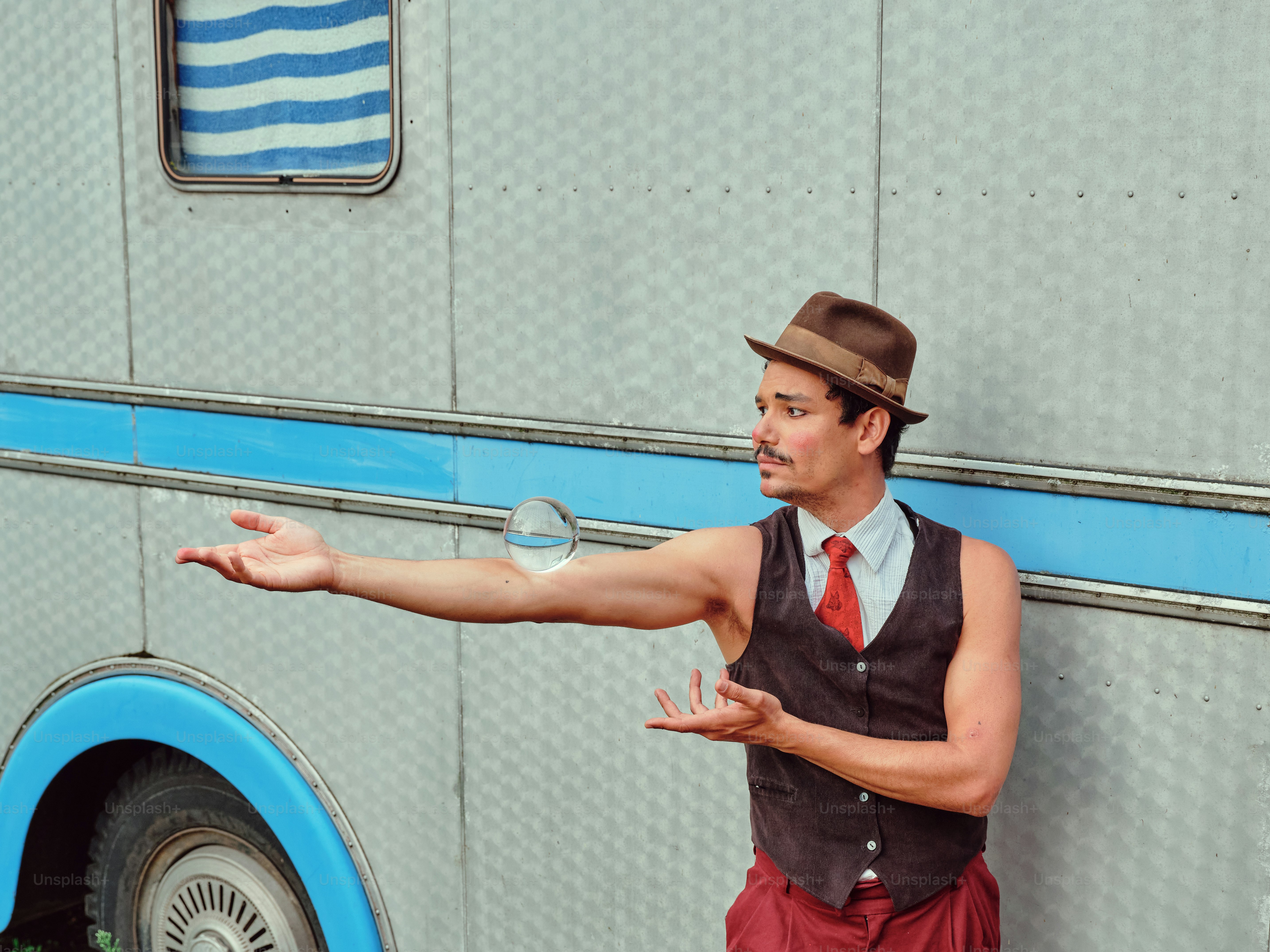 A man in a suit and tie standing in front of a fire truck photo ...