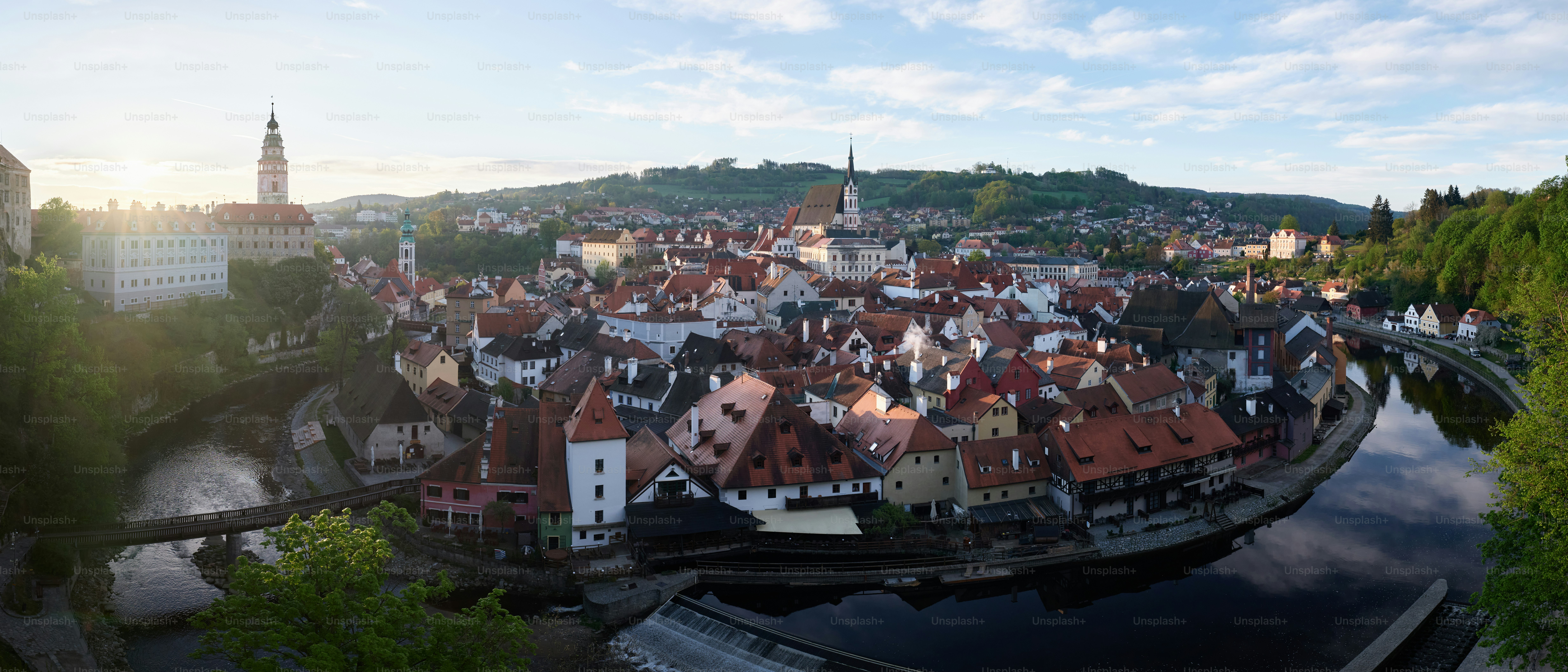 A panoramic view of a city with a river running through it