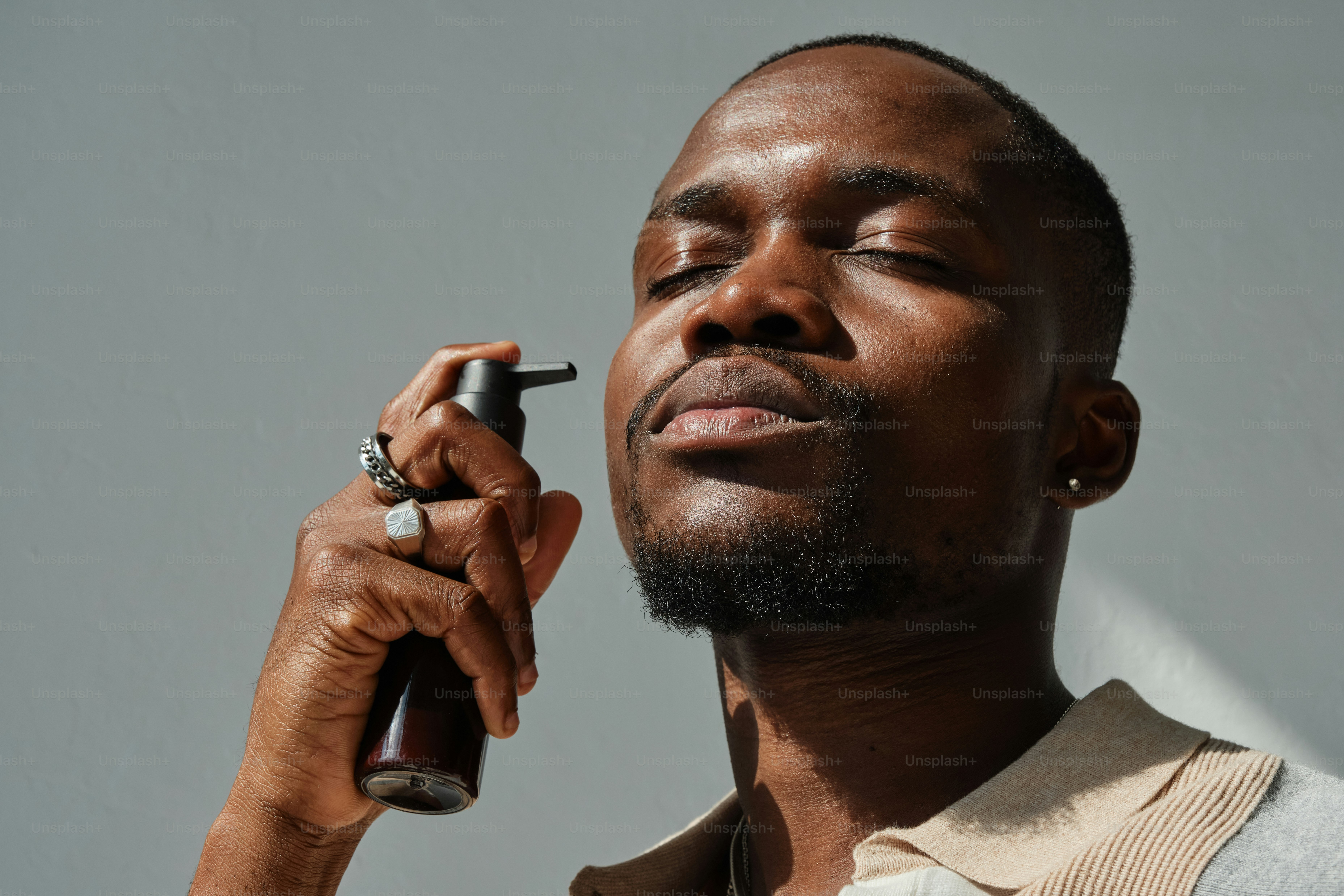 A man holding a cell phone to his ear