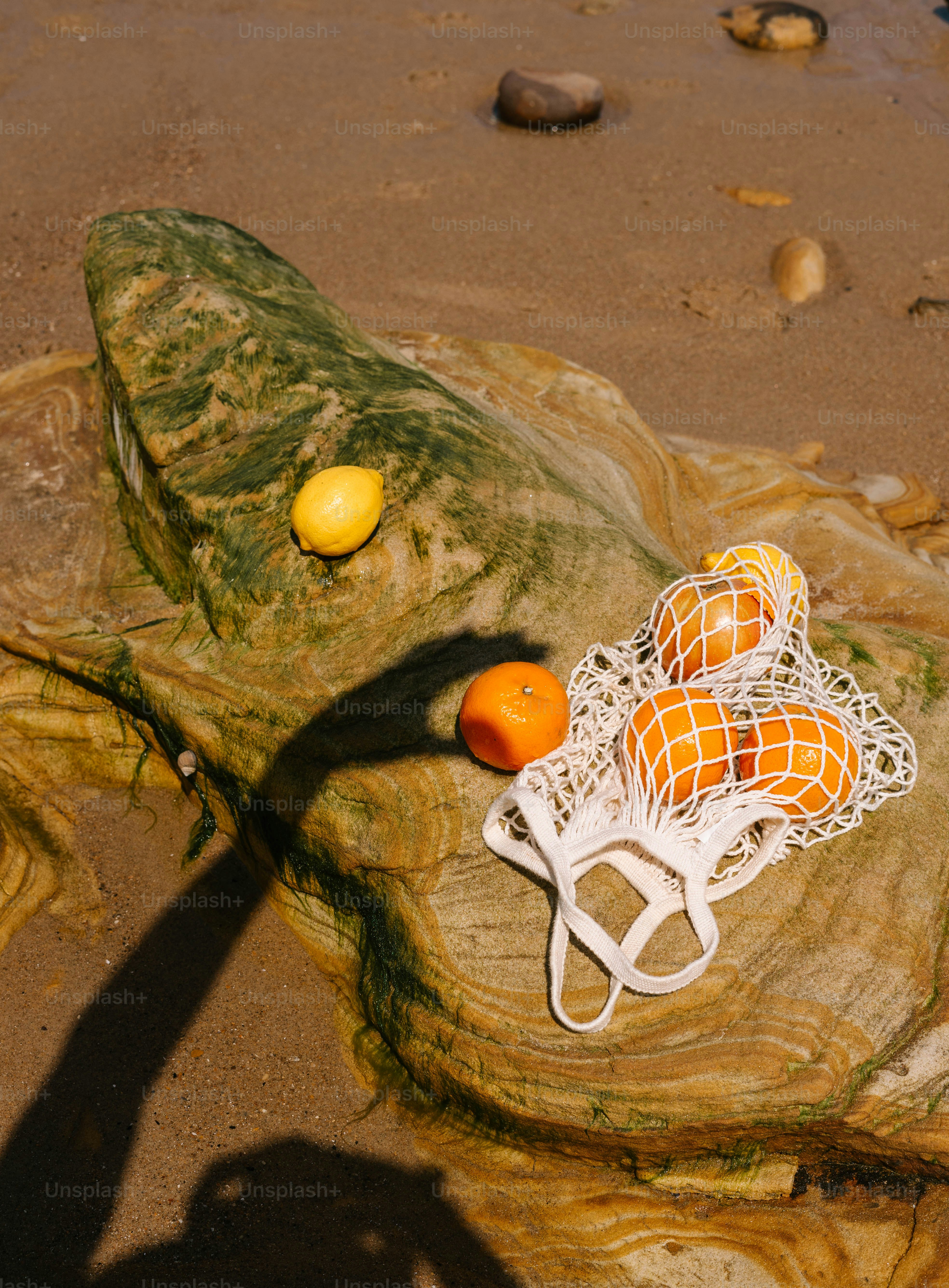 A white chair sitting on top of a sandy beach