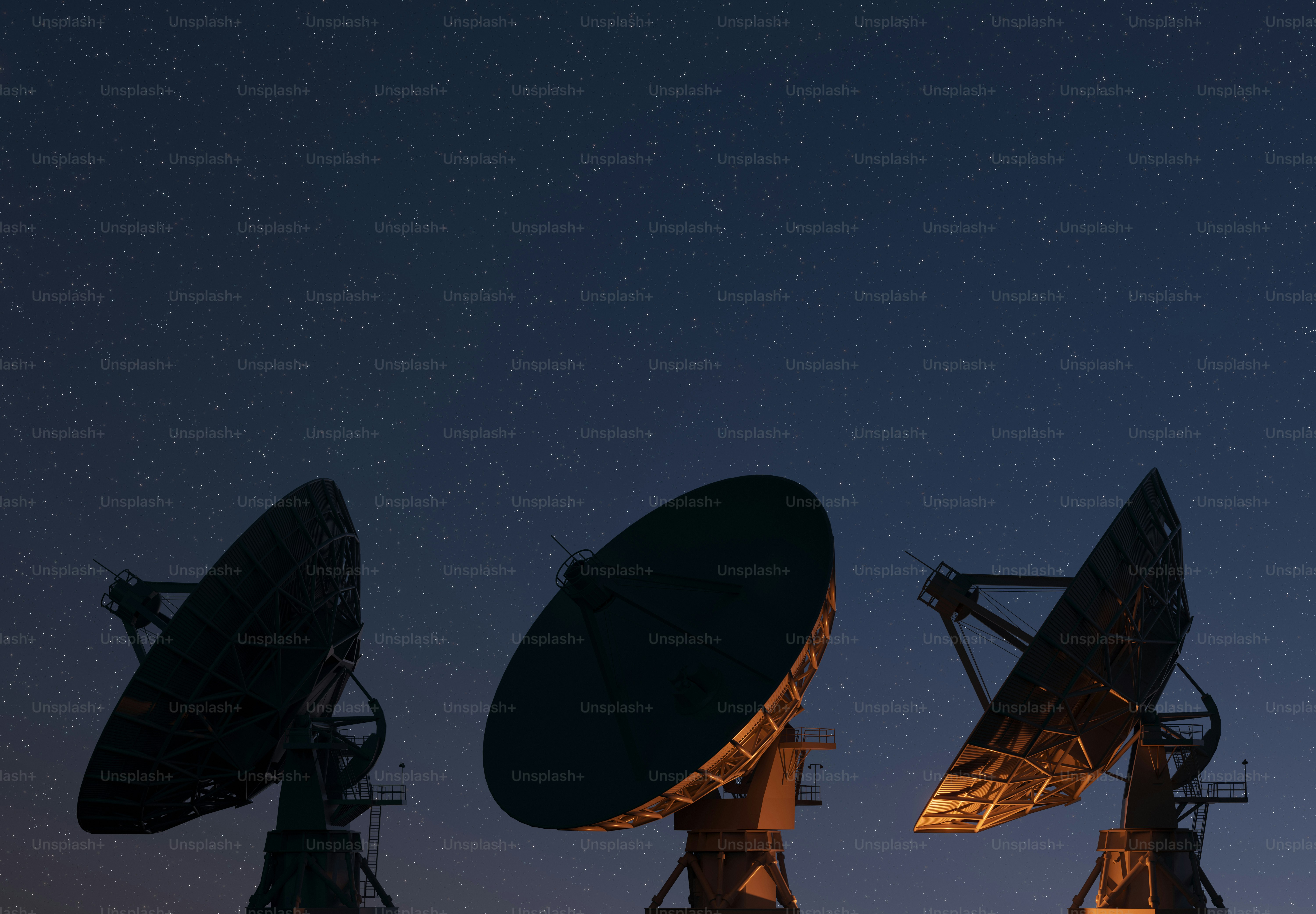 A group of satellite dishes sitting next to each other
