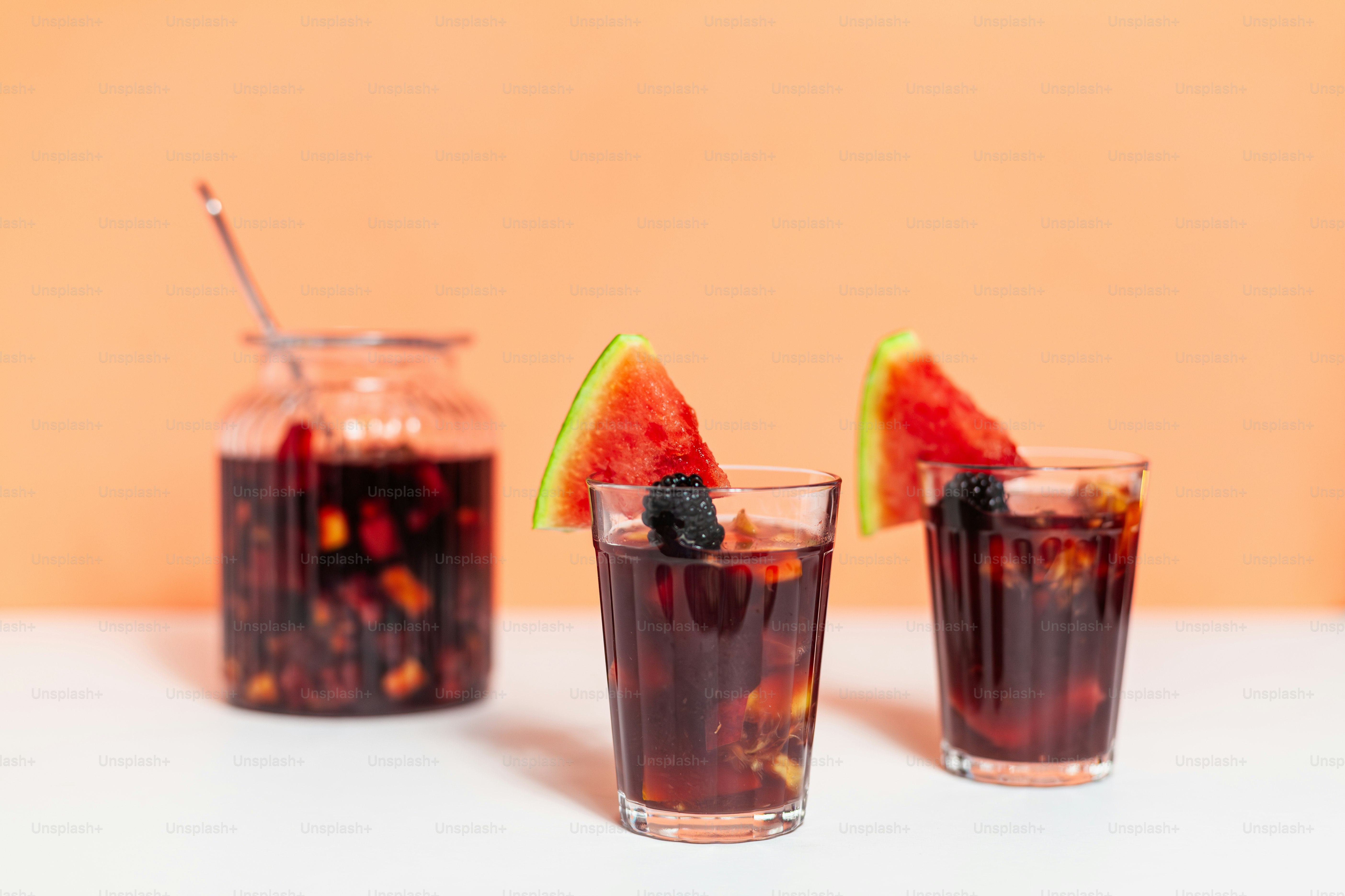 Three glasses filled with different types of drinks photo  Bar Image on  Unsplash