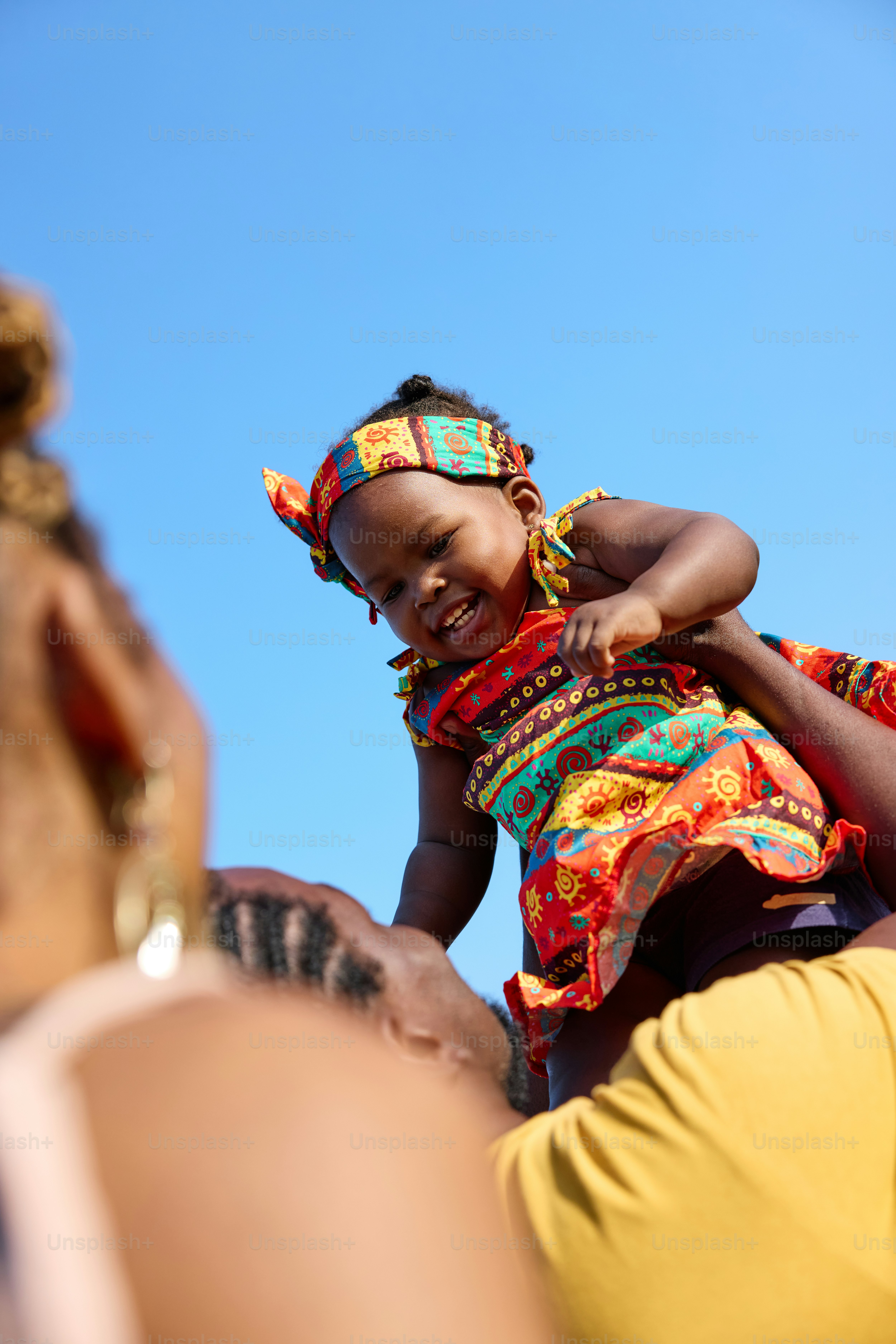 A woman holding a child in her arms