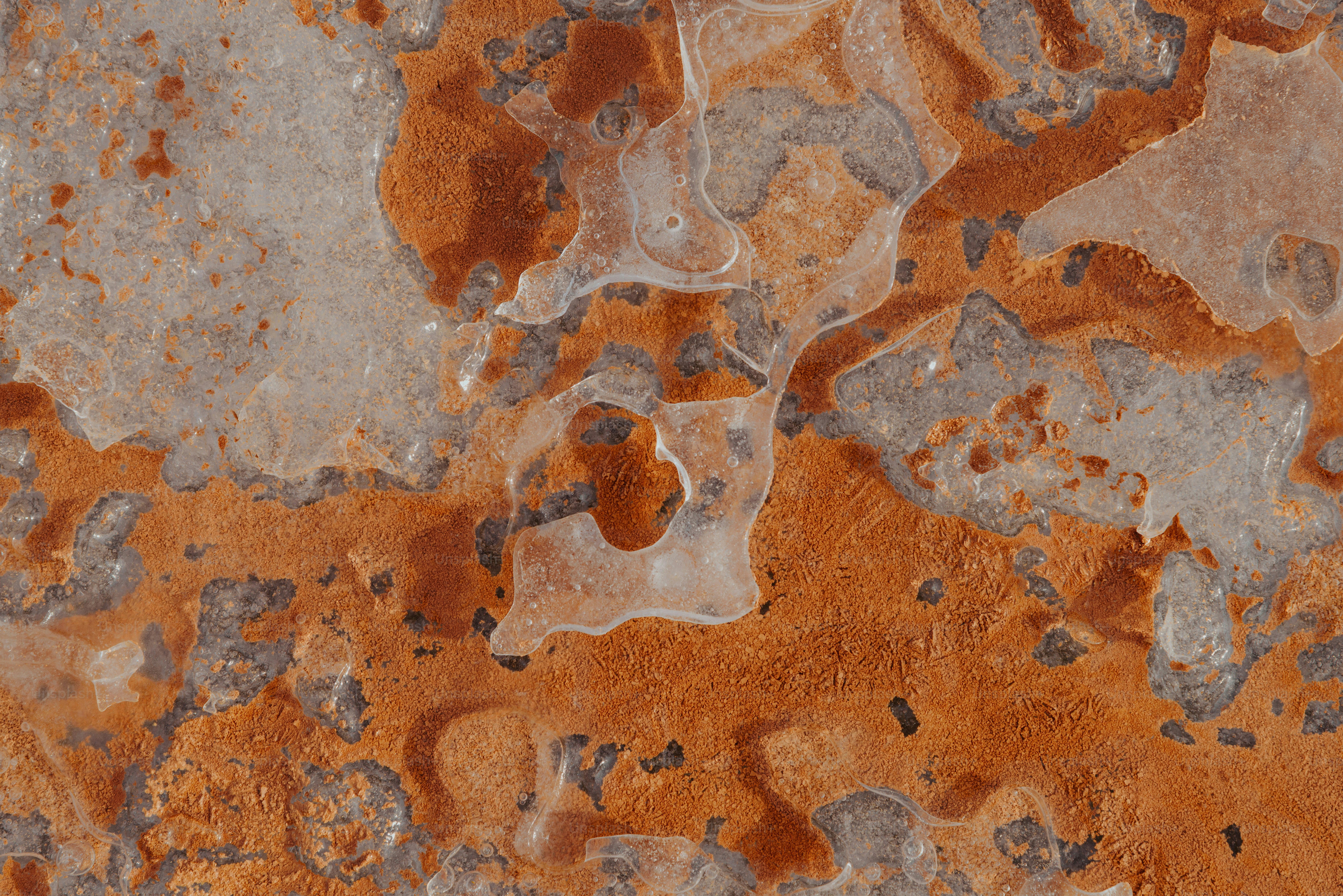 A close up of a marble surface with brown and gray colors