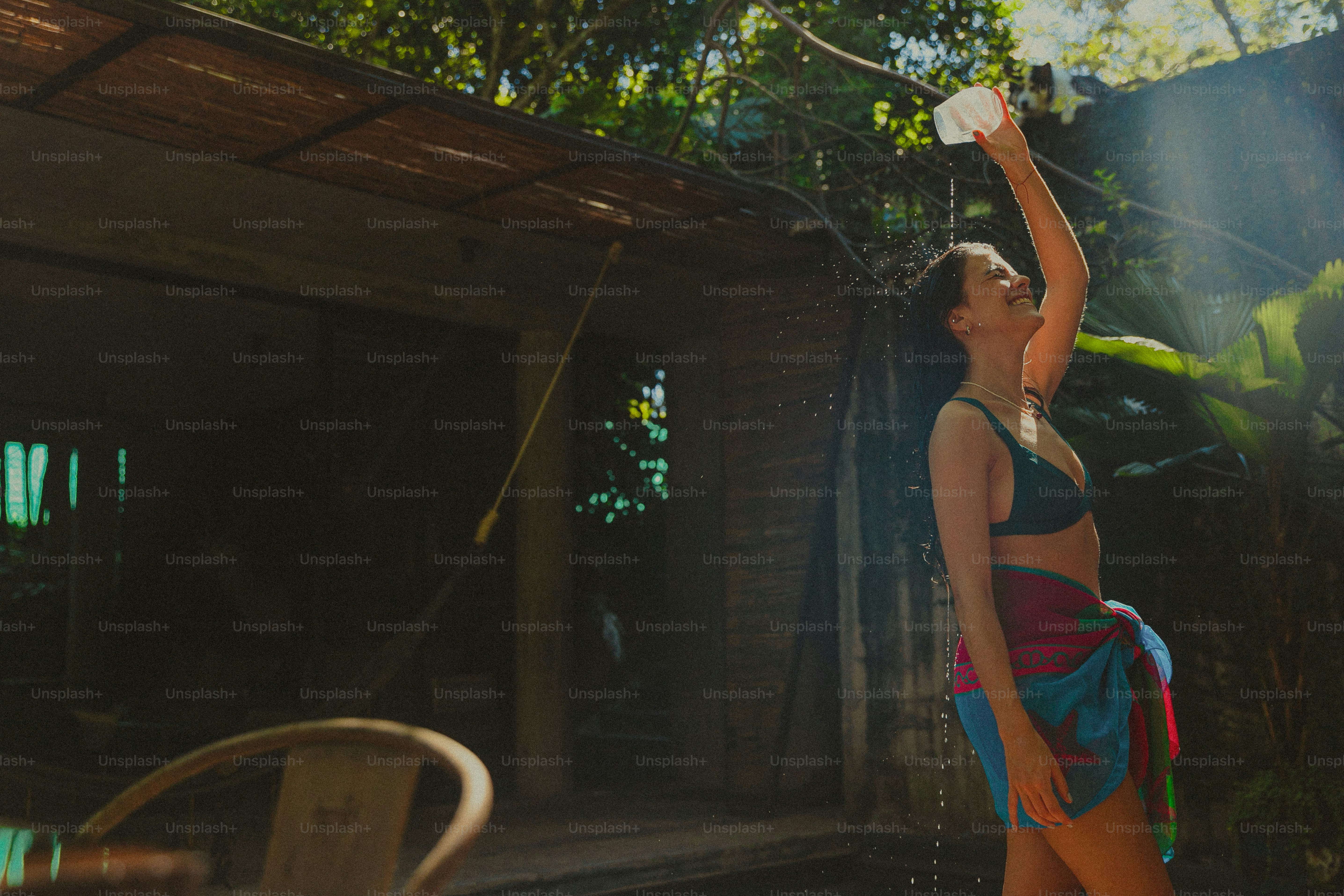 A woman in a bathing suit standing in a pool