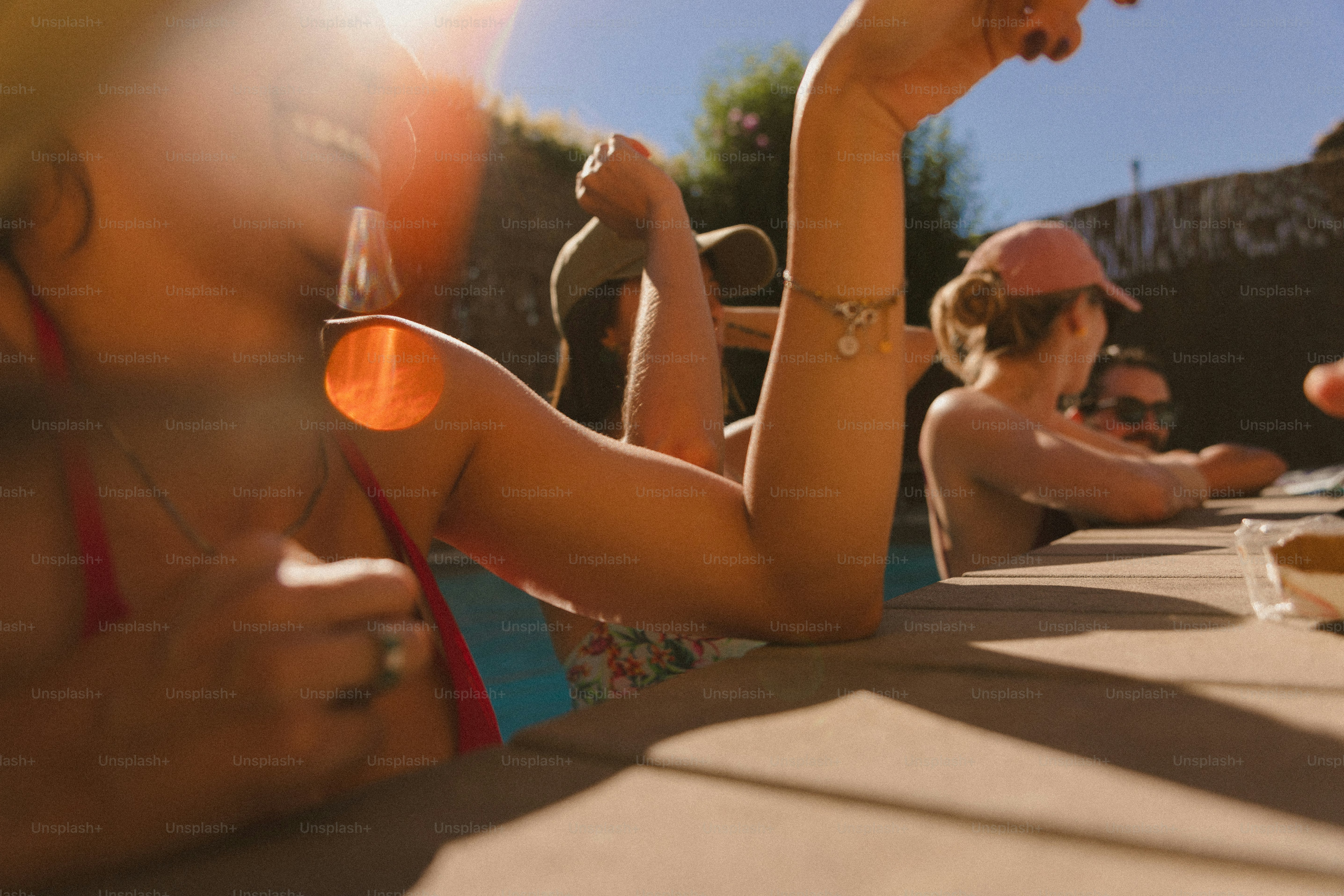 A group of people sitting around a table eating food