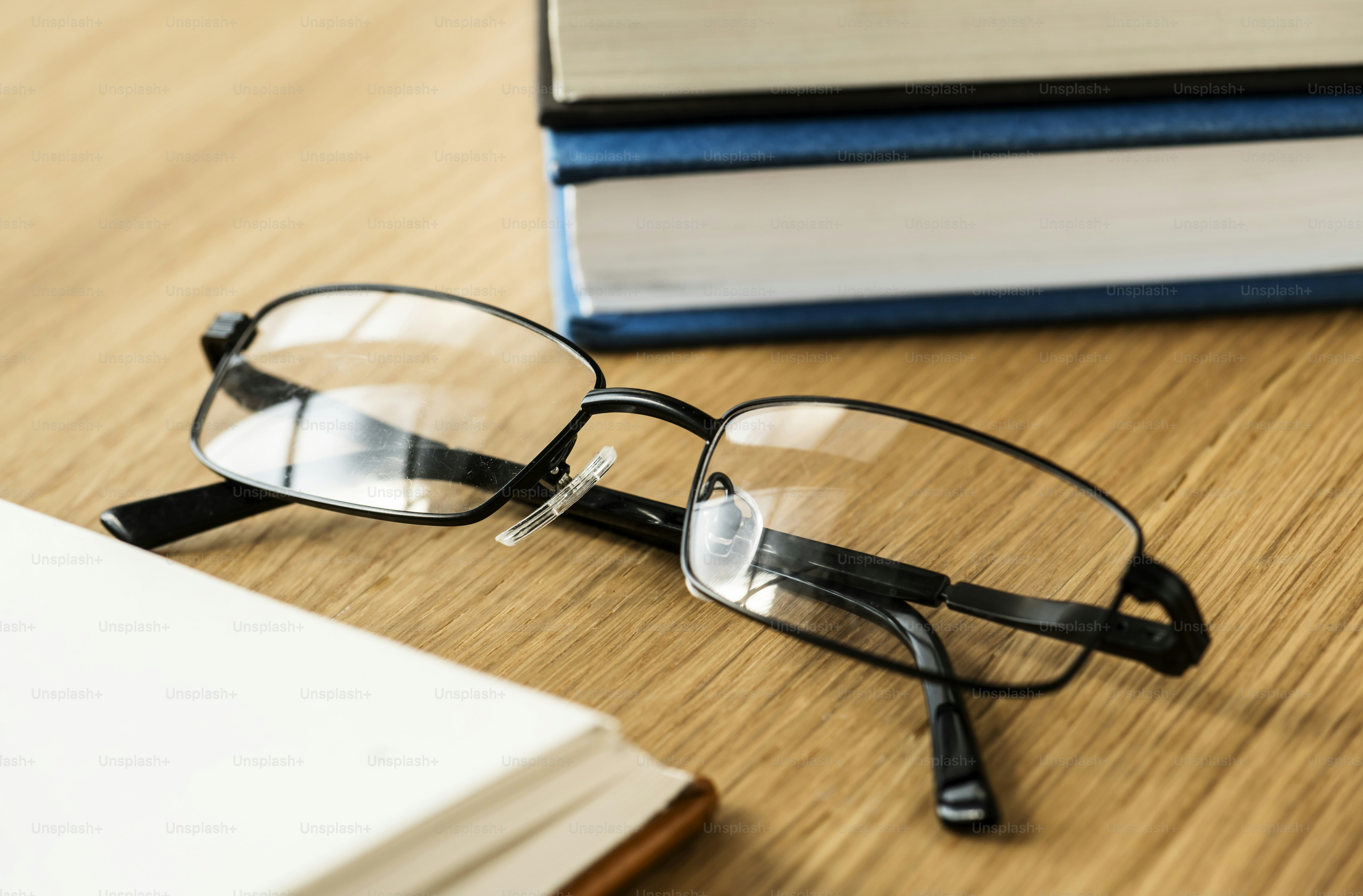A pair of glasses and books educational, academic and litera