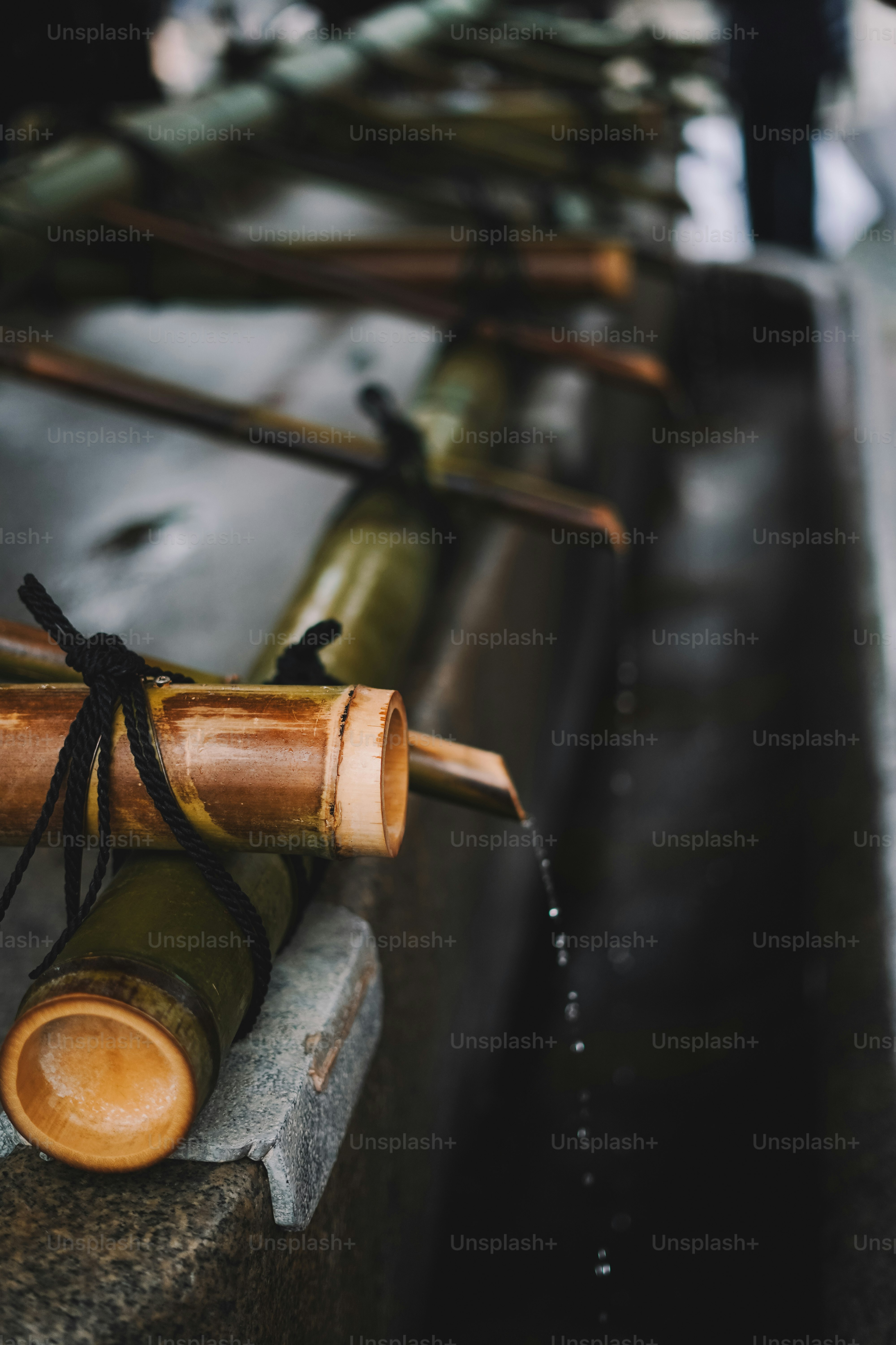 A close up of a water pipe on a bench