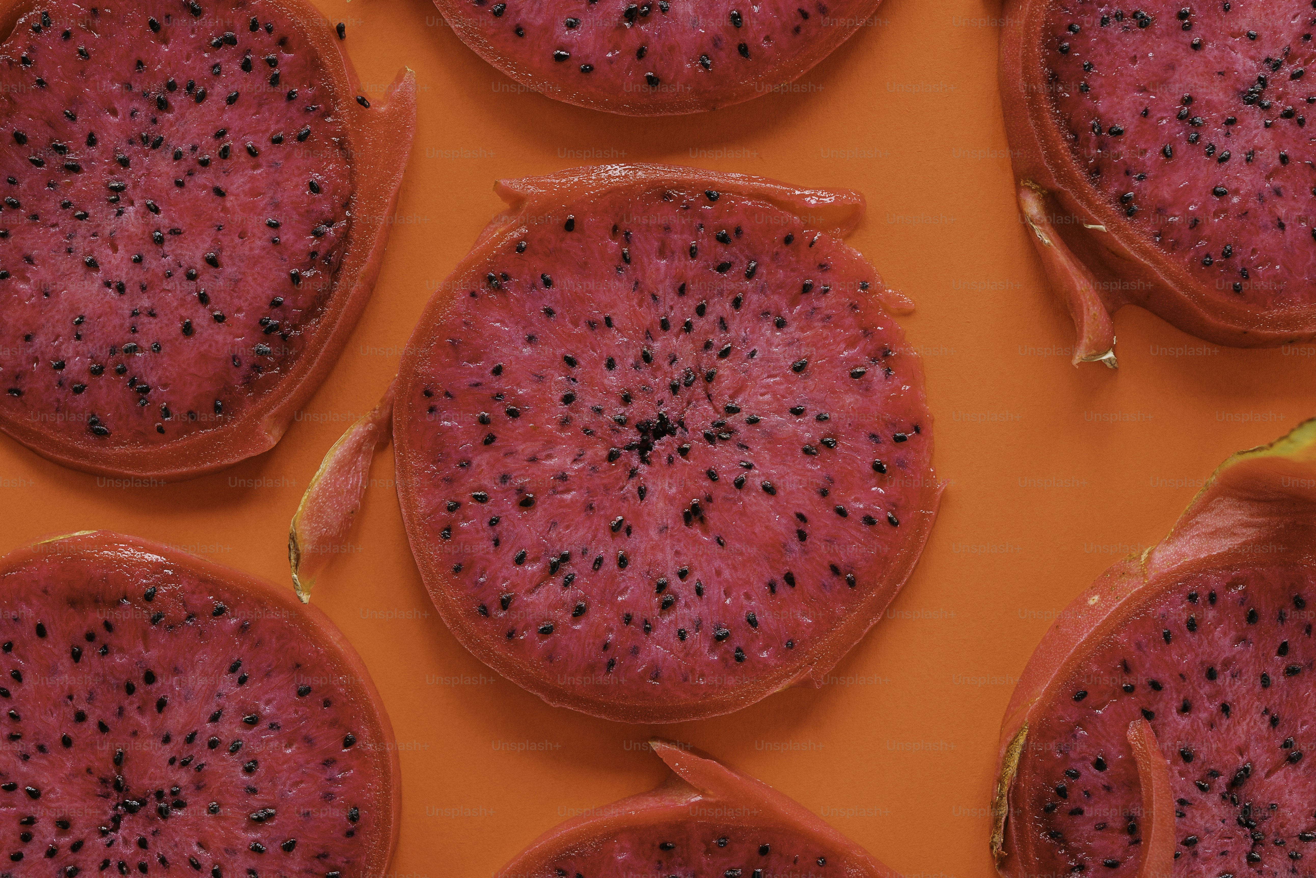 A close up of a bunch of food on an orange surface