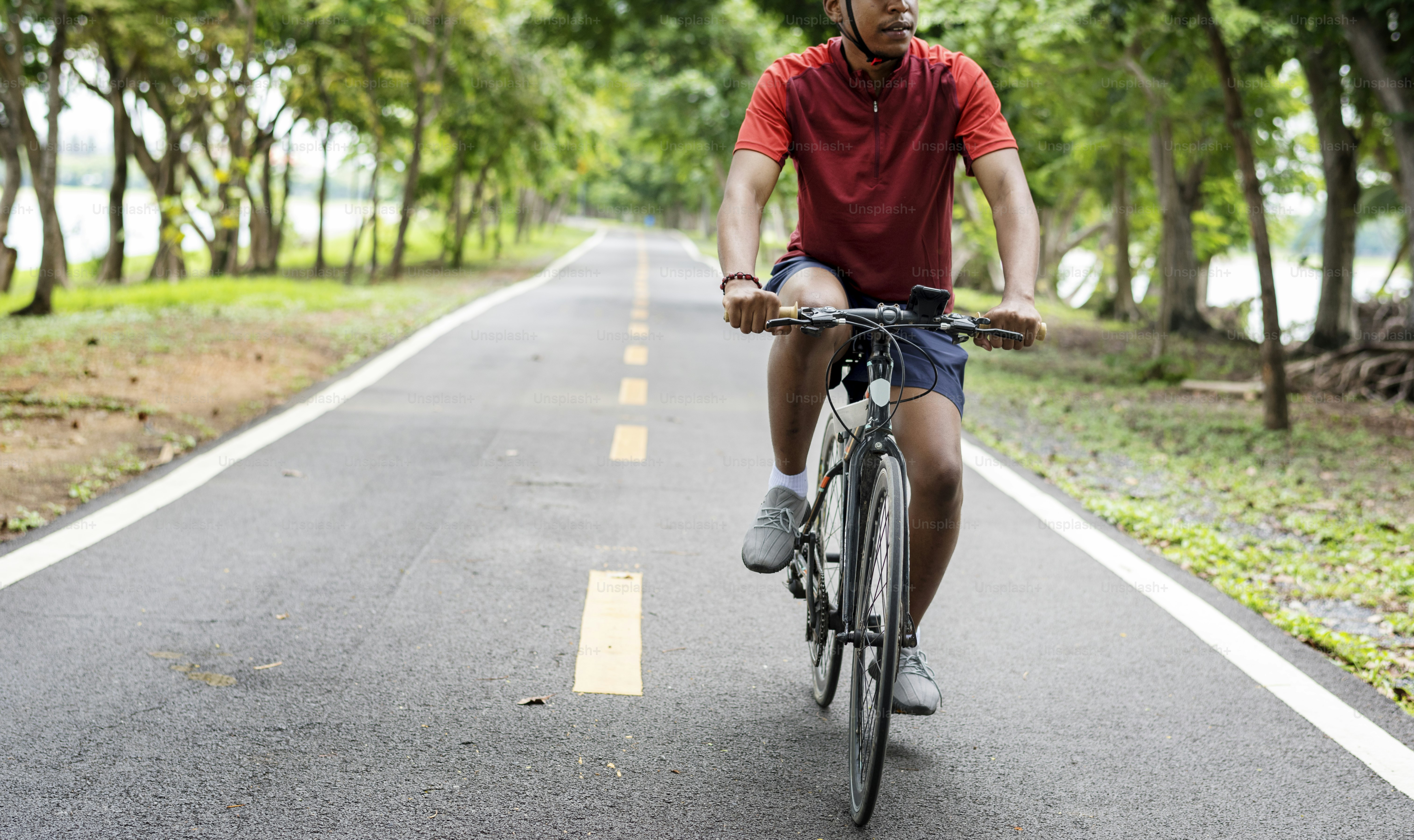 Cyclist riding a bike in a park