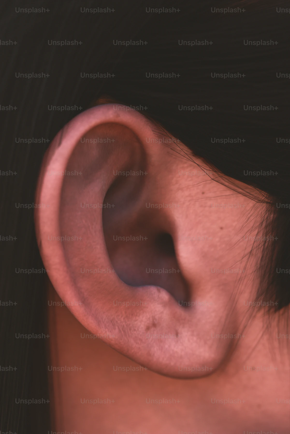 Close-up of an ear and earring