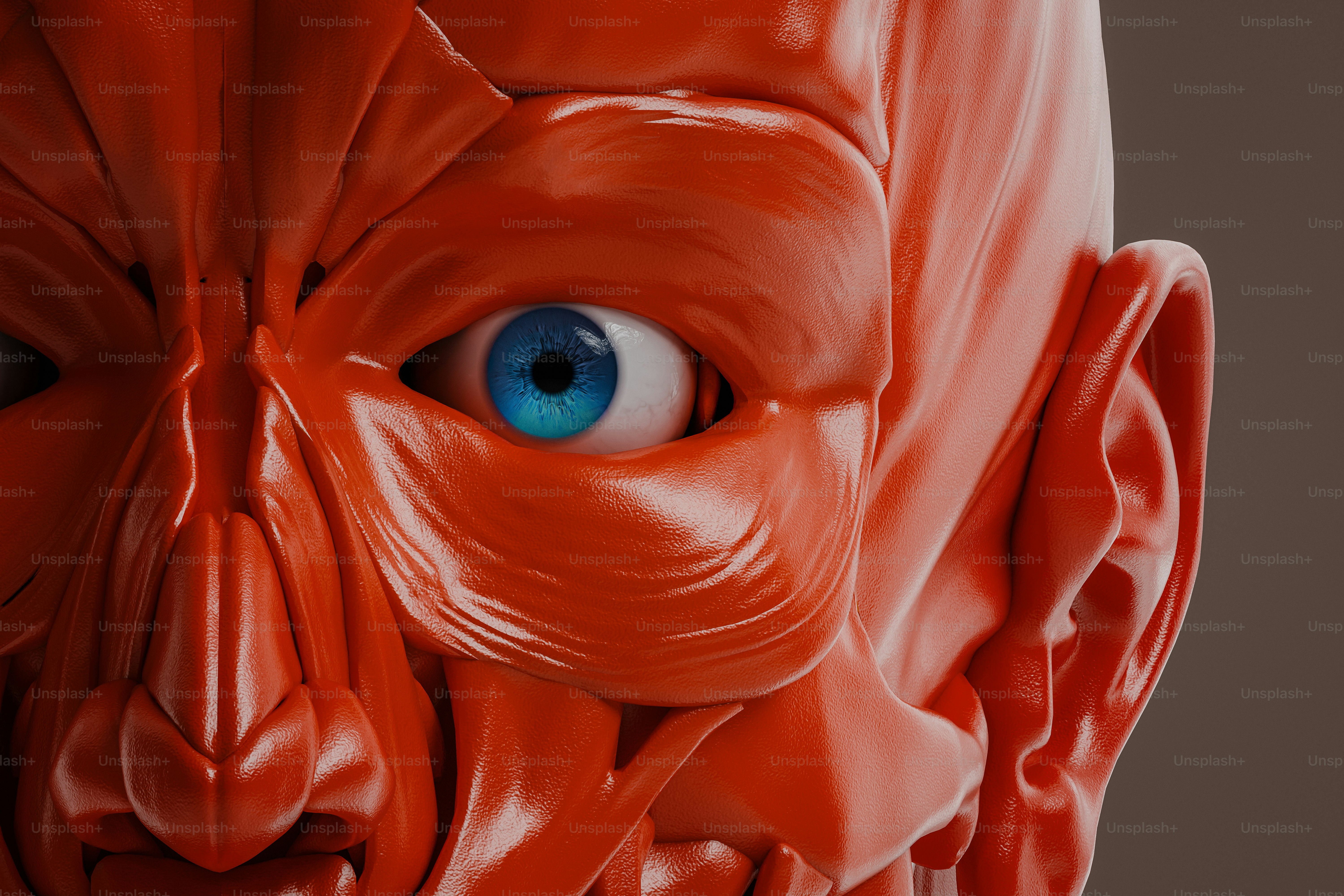 A close up of a human head with blue eyes