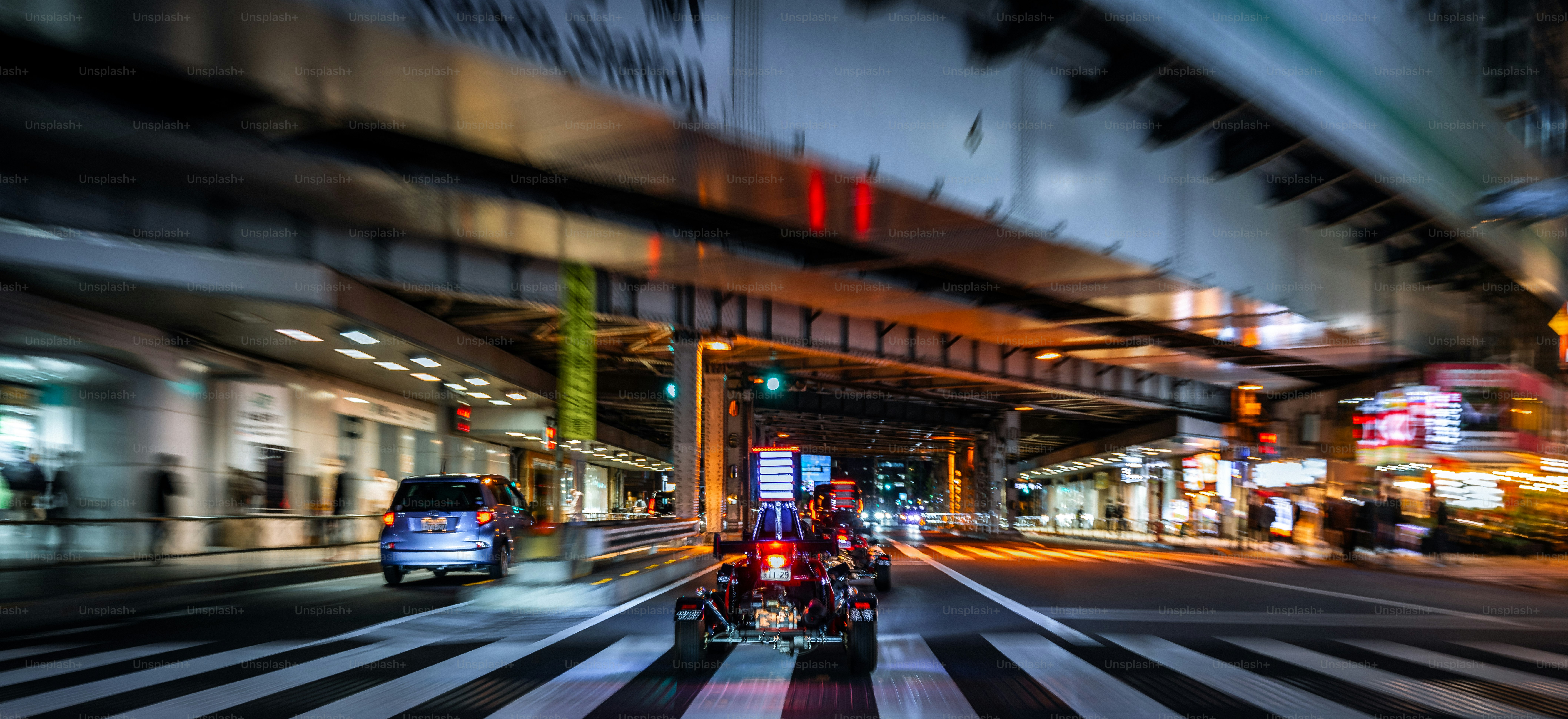 A blurry photo of a city street at night