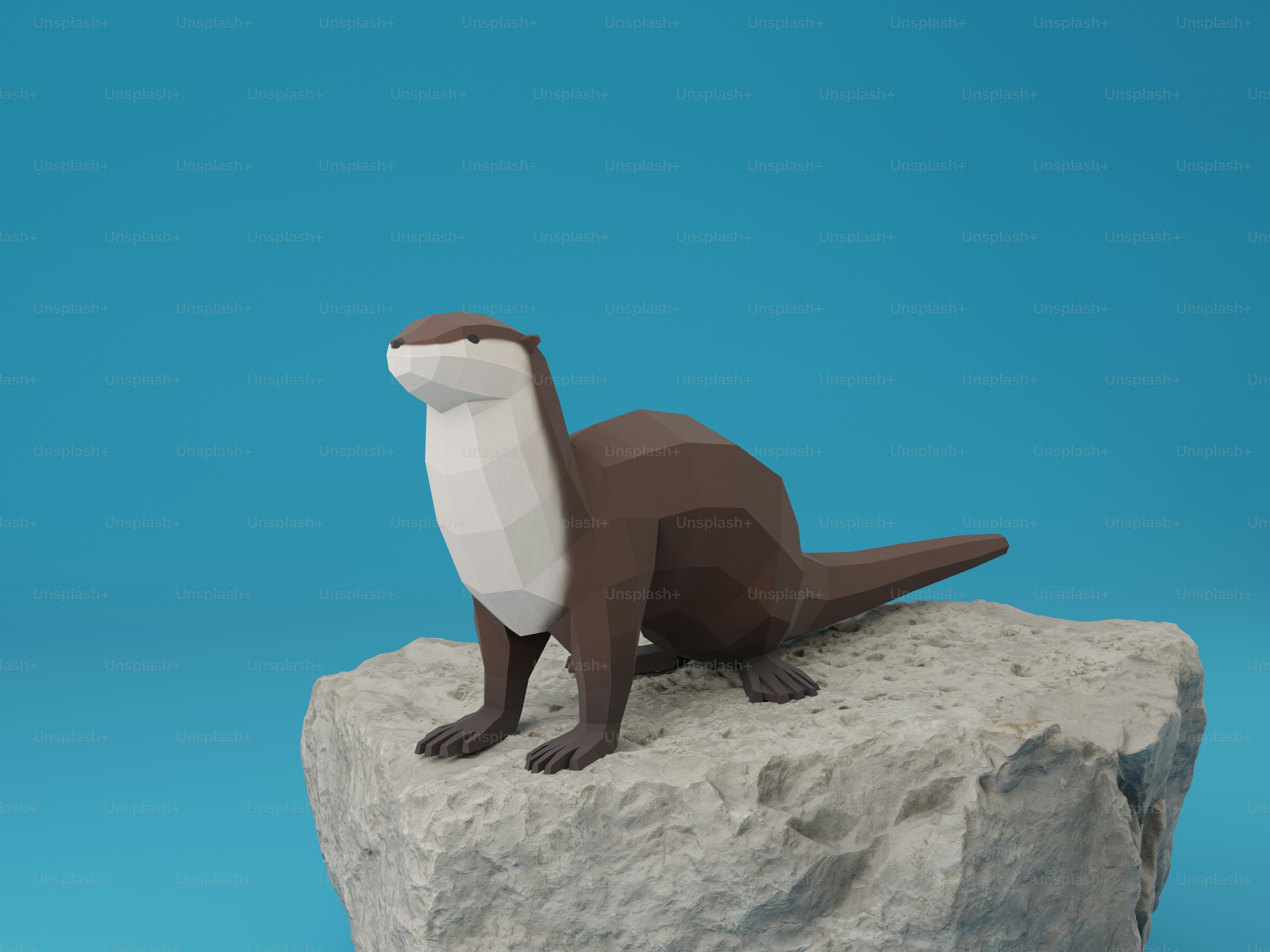 A toy otter sitting on top of a rock