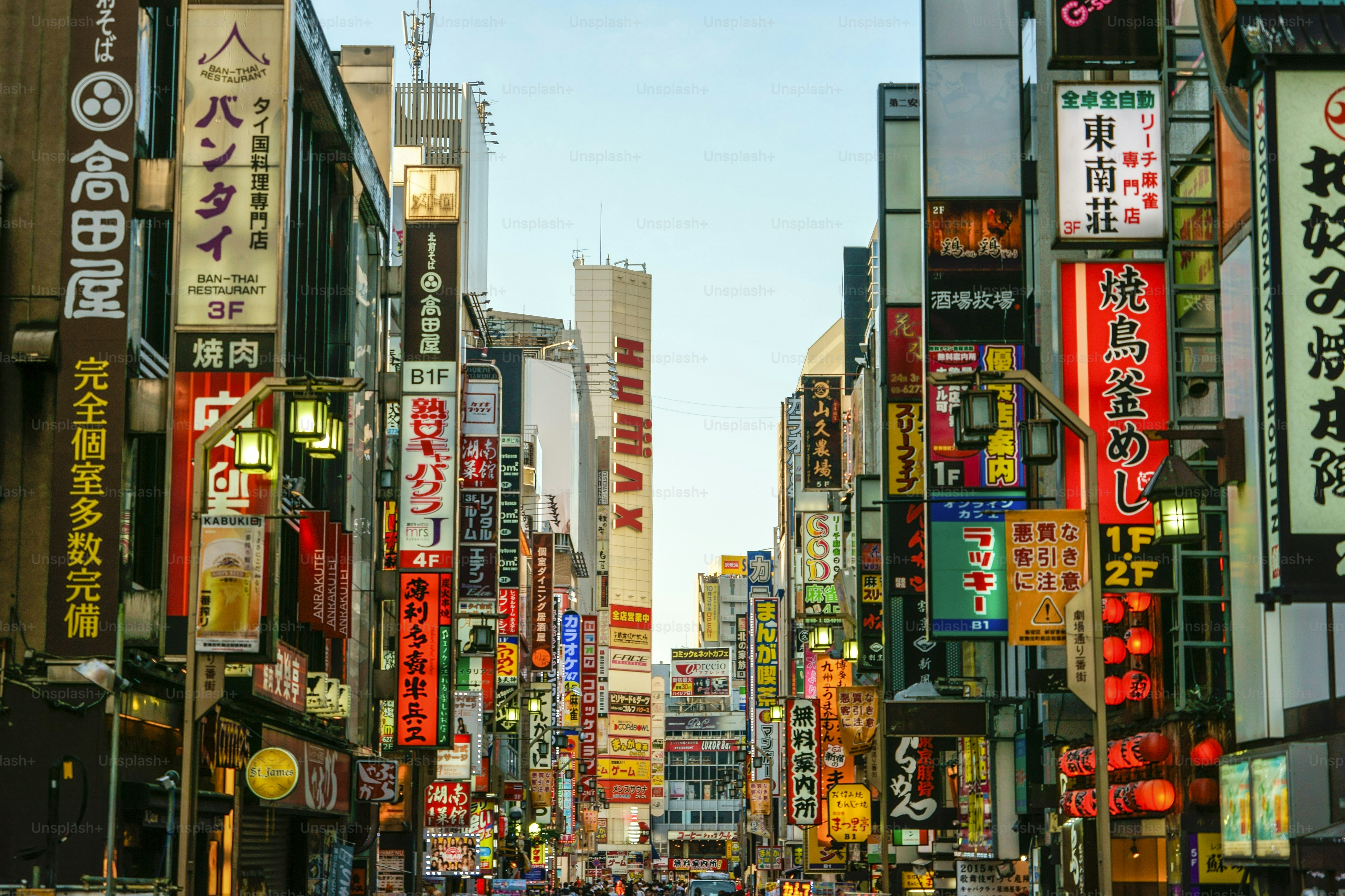 A city street filled with lots of tall buildings