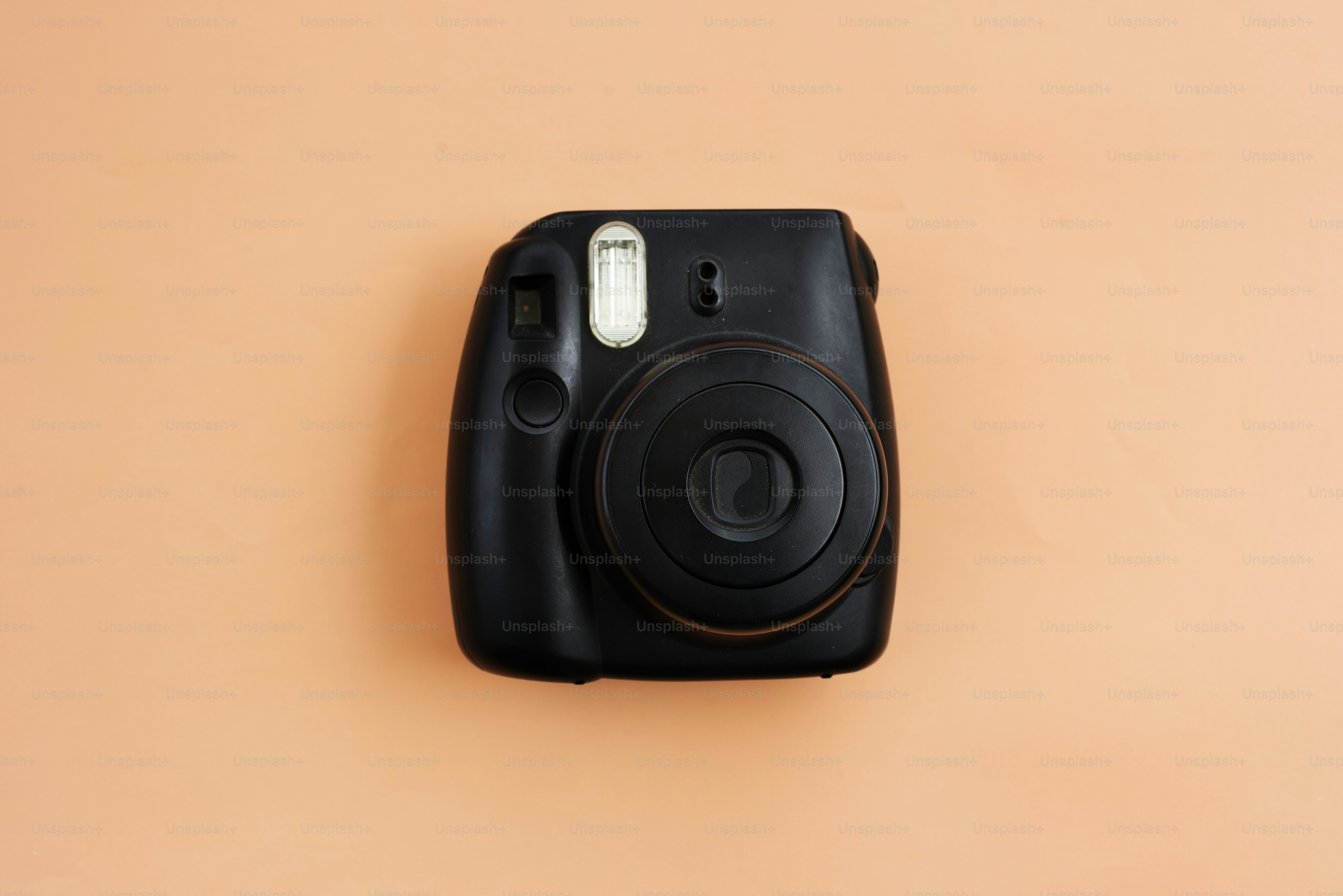 Vintage retro camera isolated on background