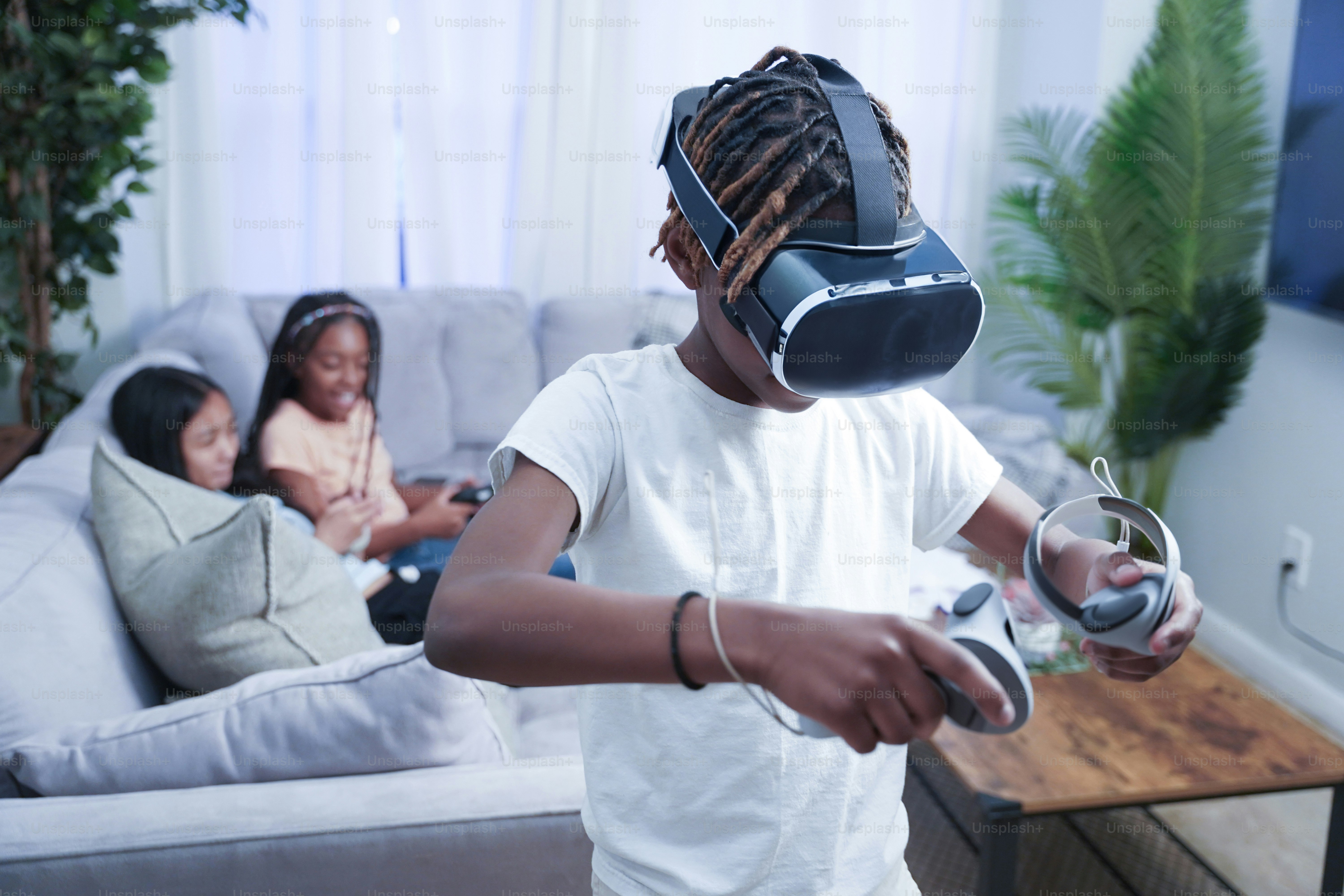 A young boy playing a video game with a virtual controller