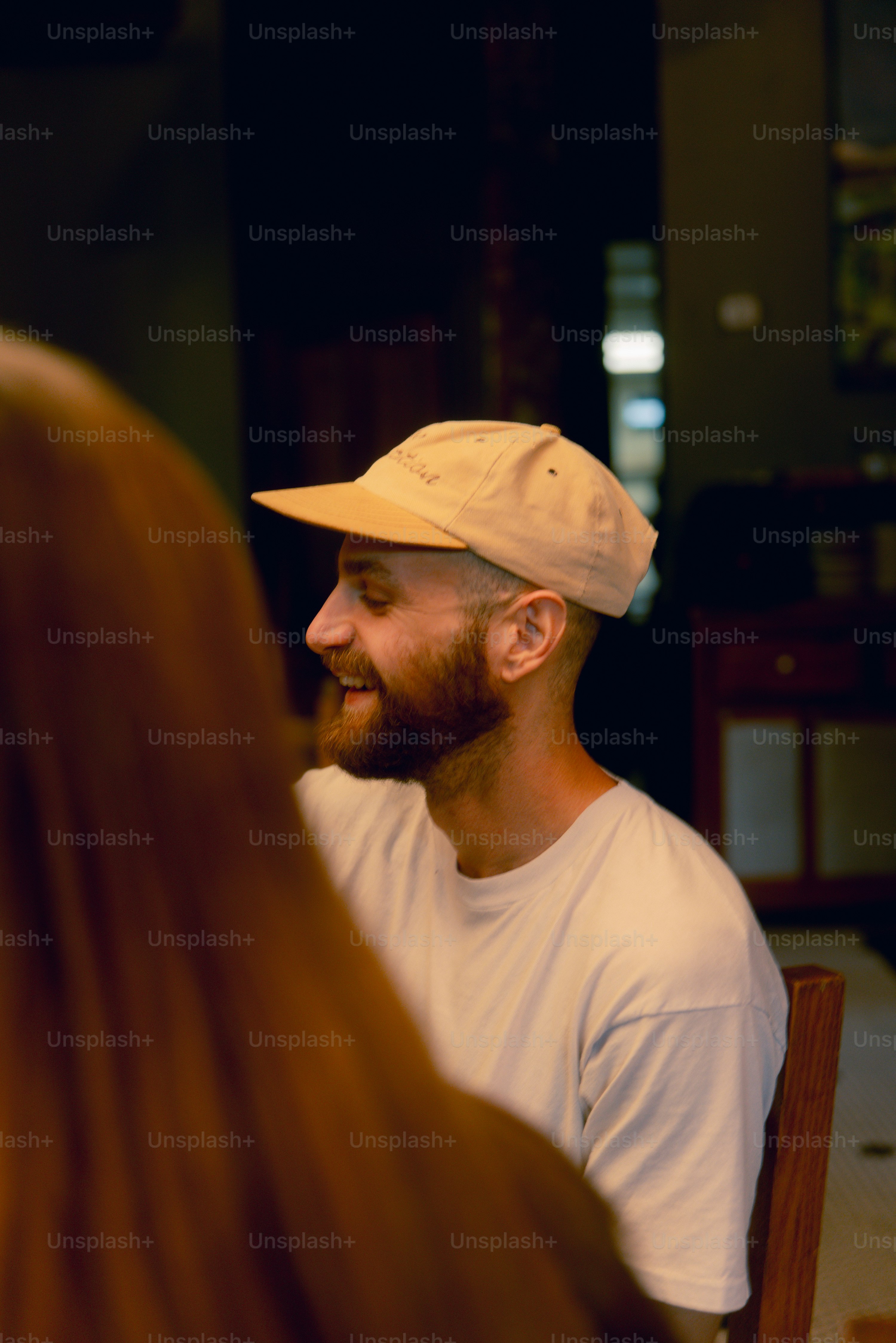 A man sitting at a table with a woman