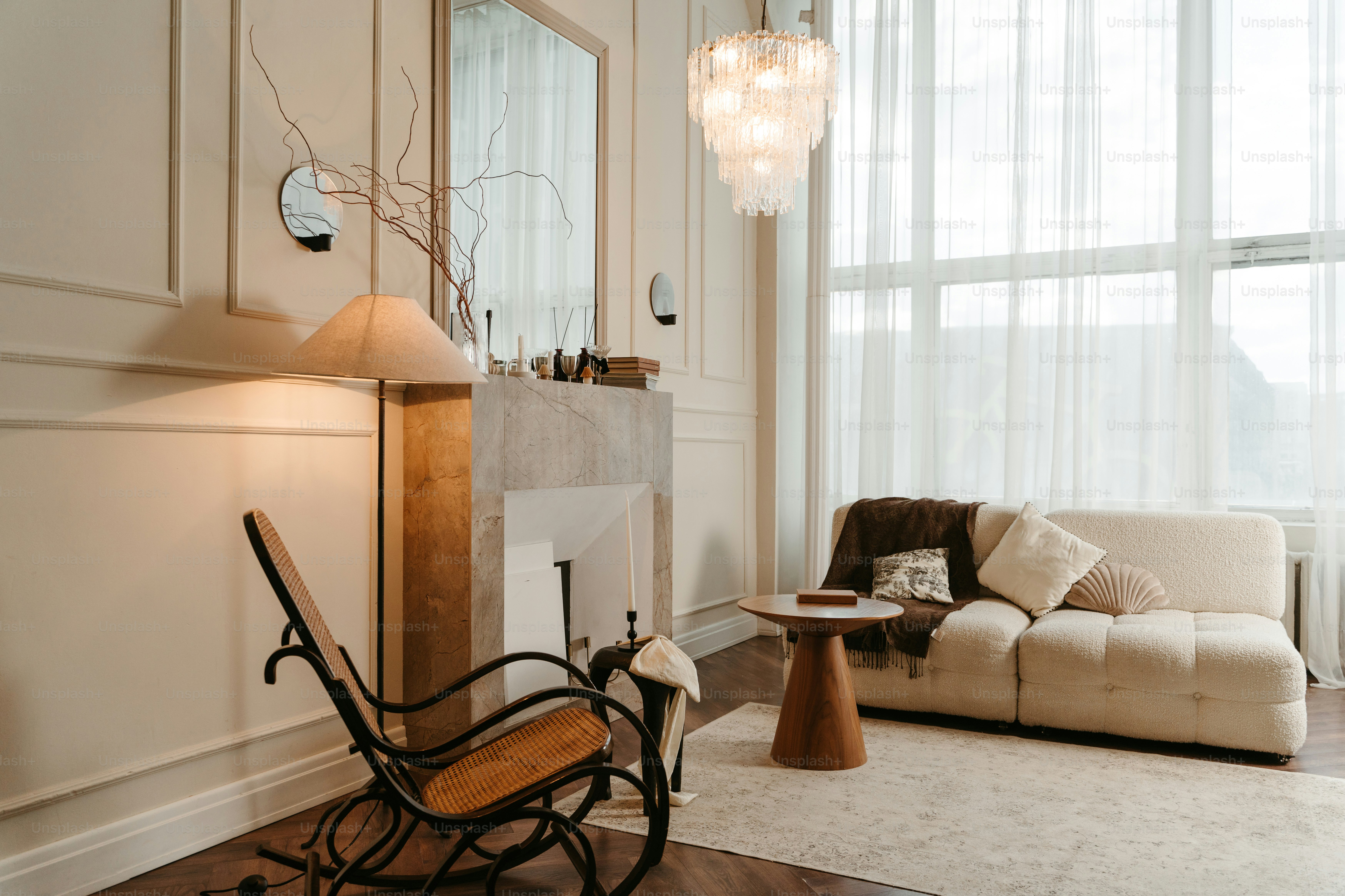 A living room filled with furniture and a fire place