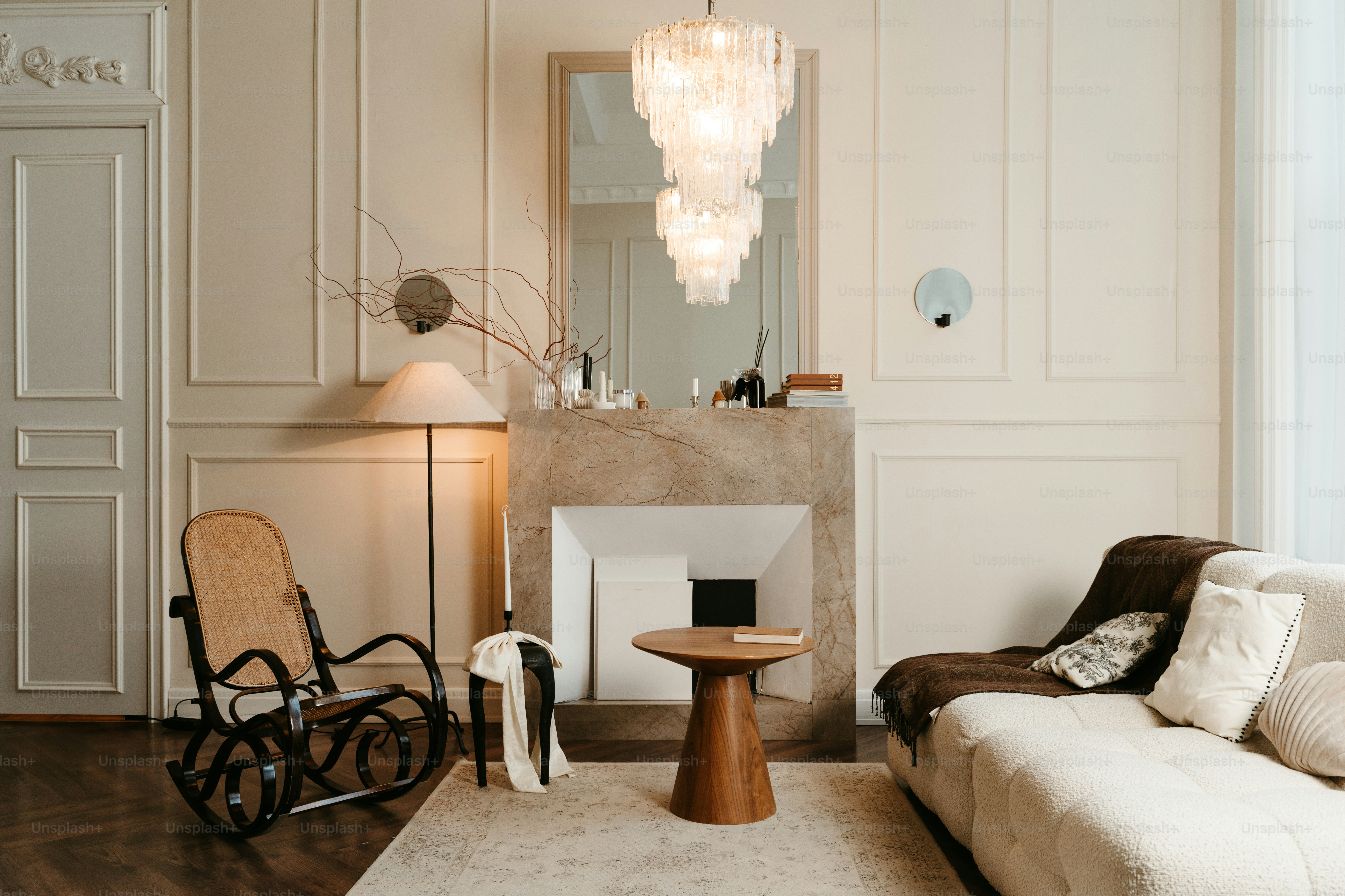 A living room filled with furniture and a fire place