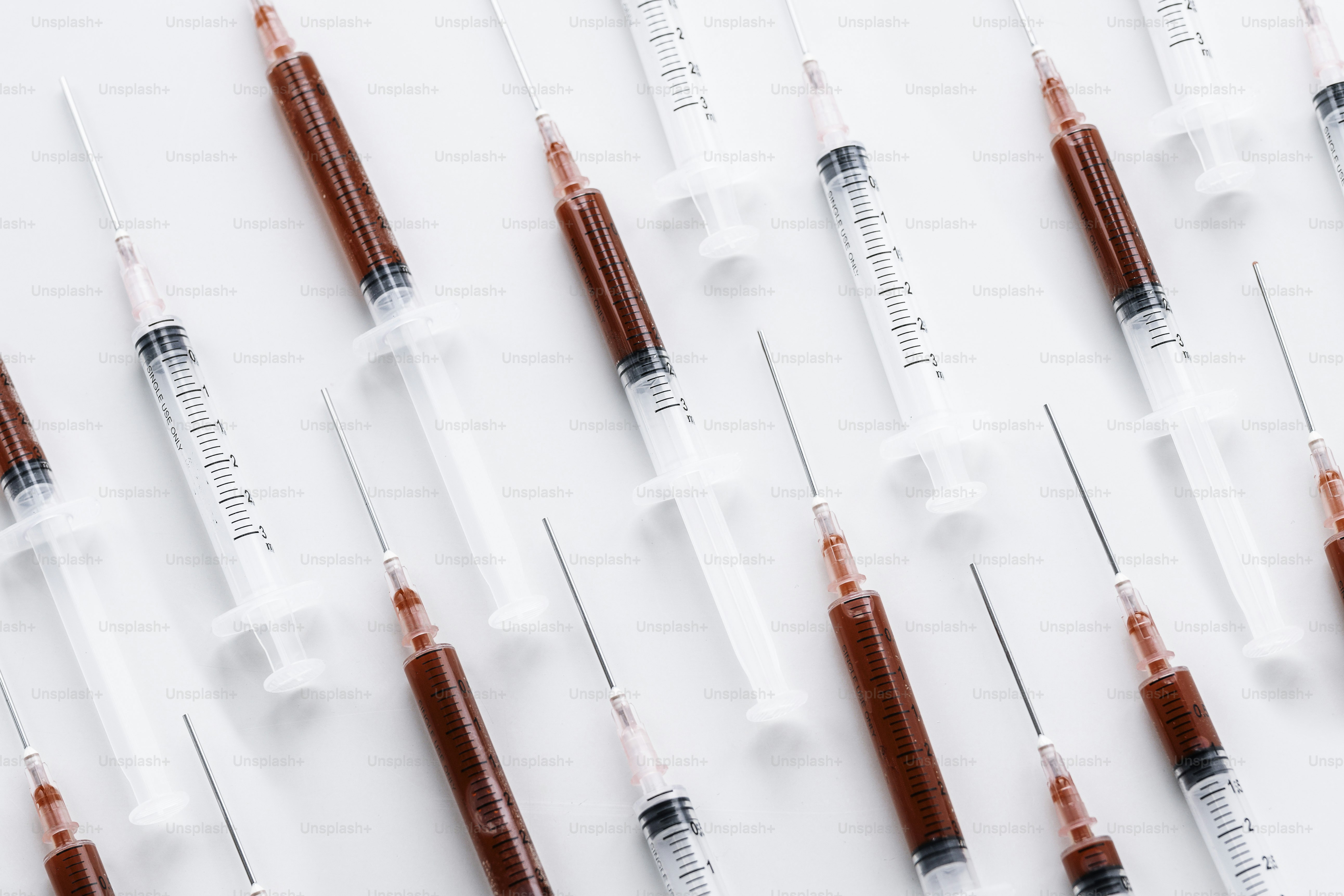 A group of red and white sys lined up in a row