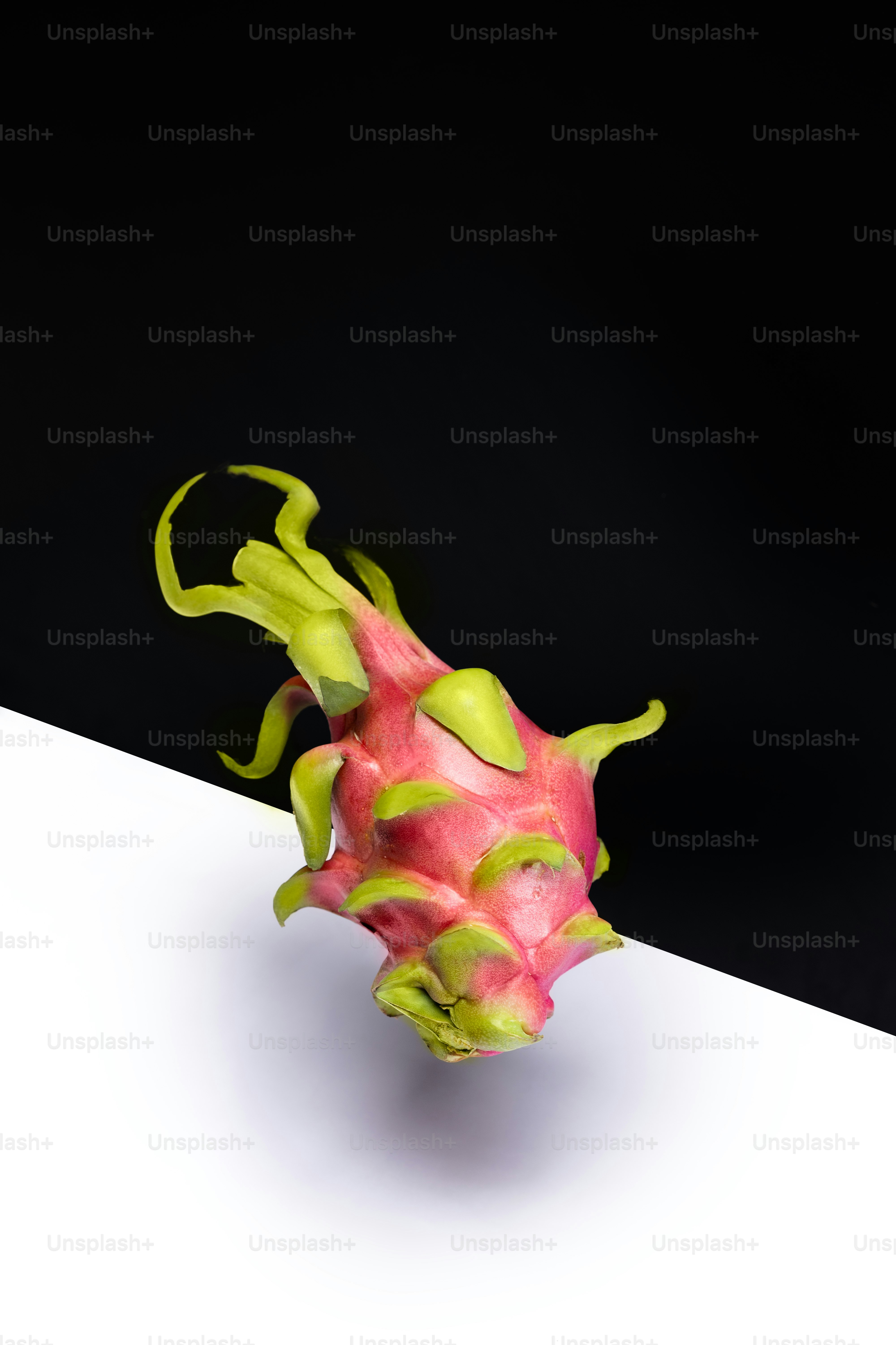 A dragon fruit sitting on top of a white table