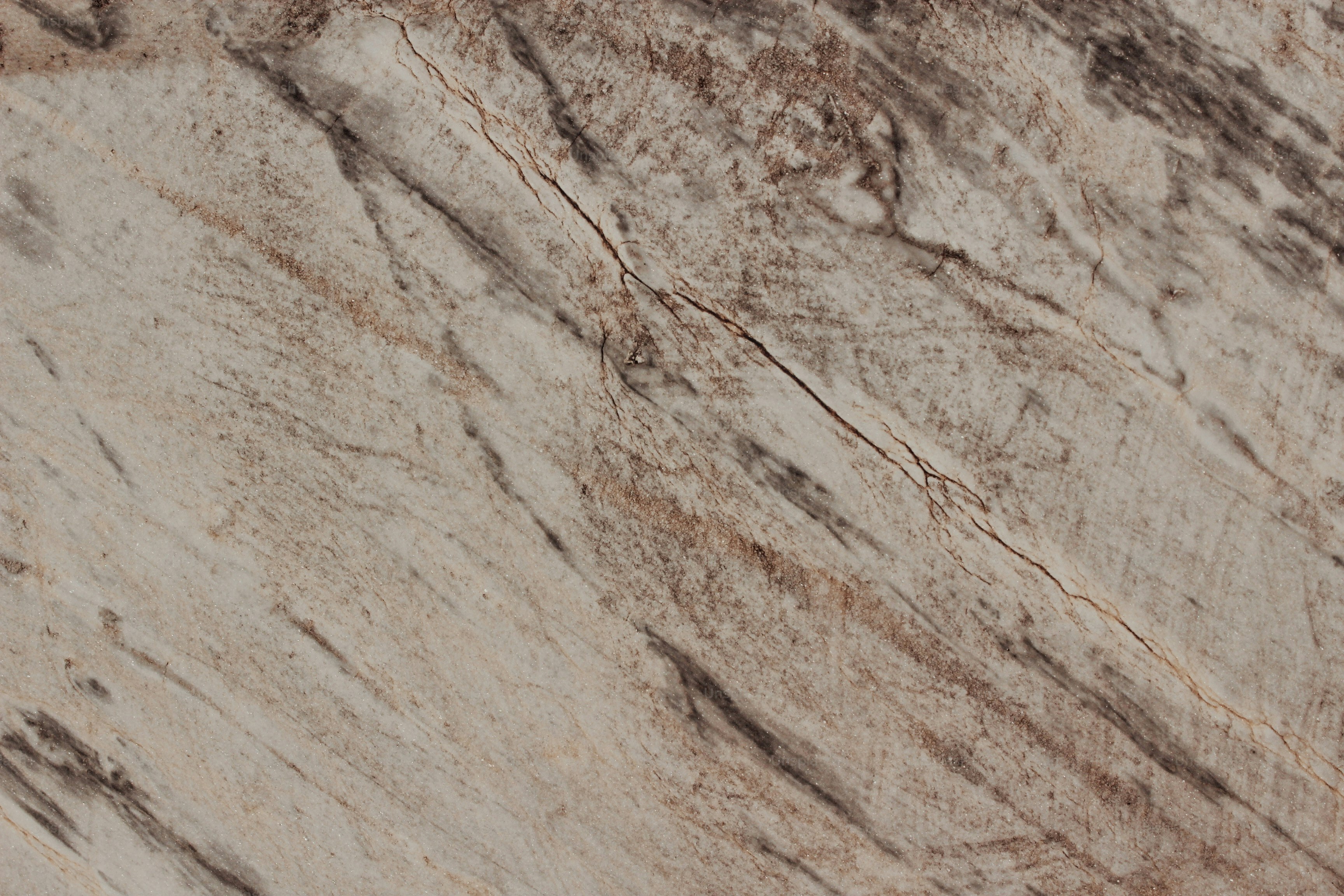 A close up of a marble surface with a brown and white pattern photo ...