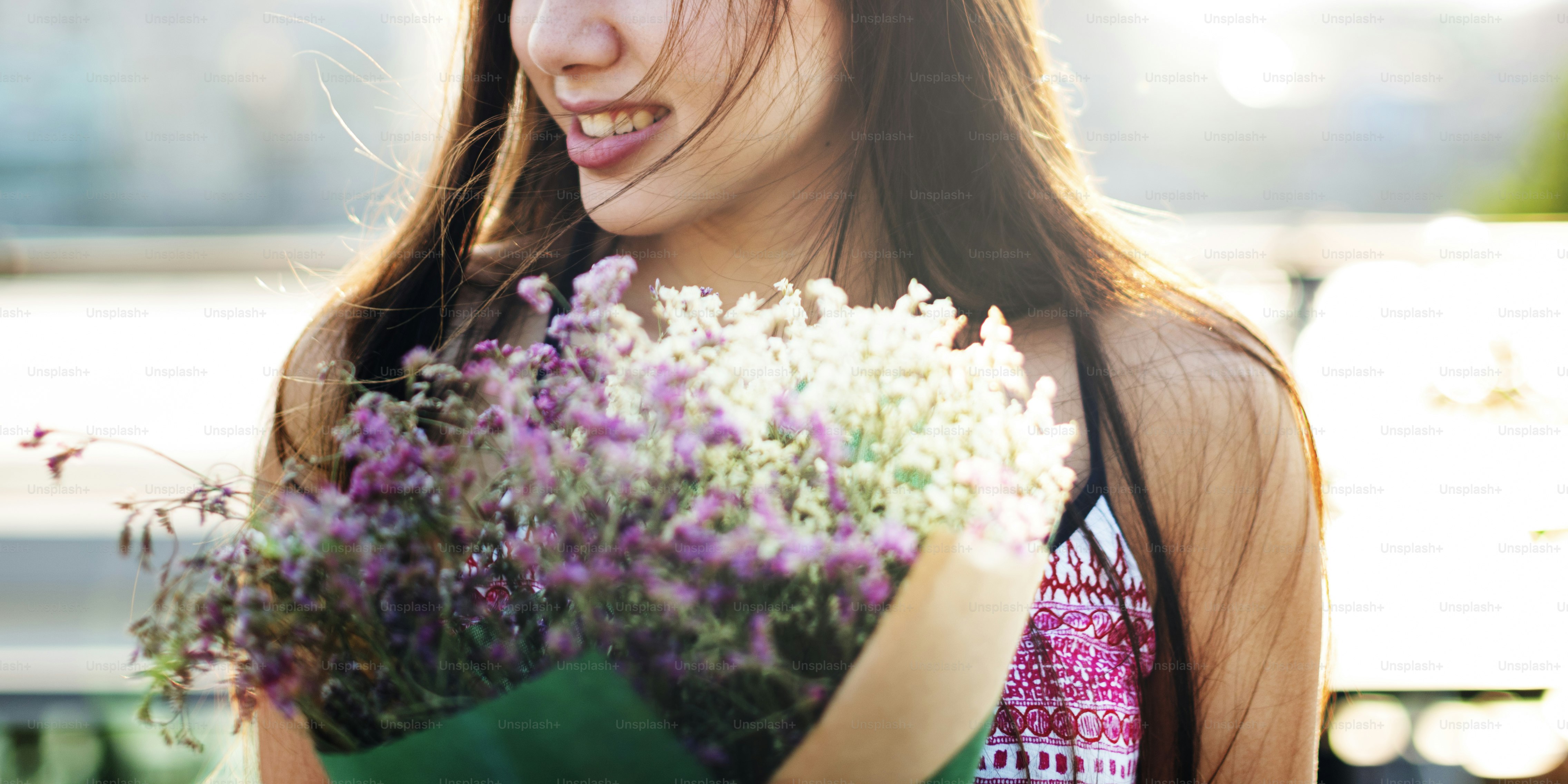 Young Happy Woman Holding Flowers Concept