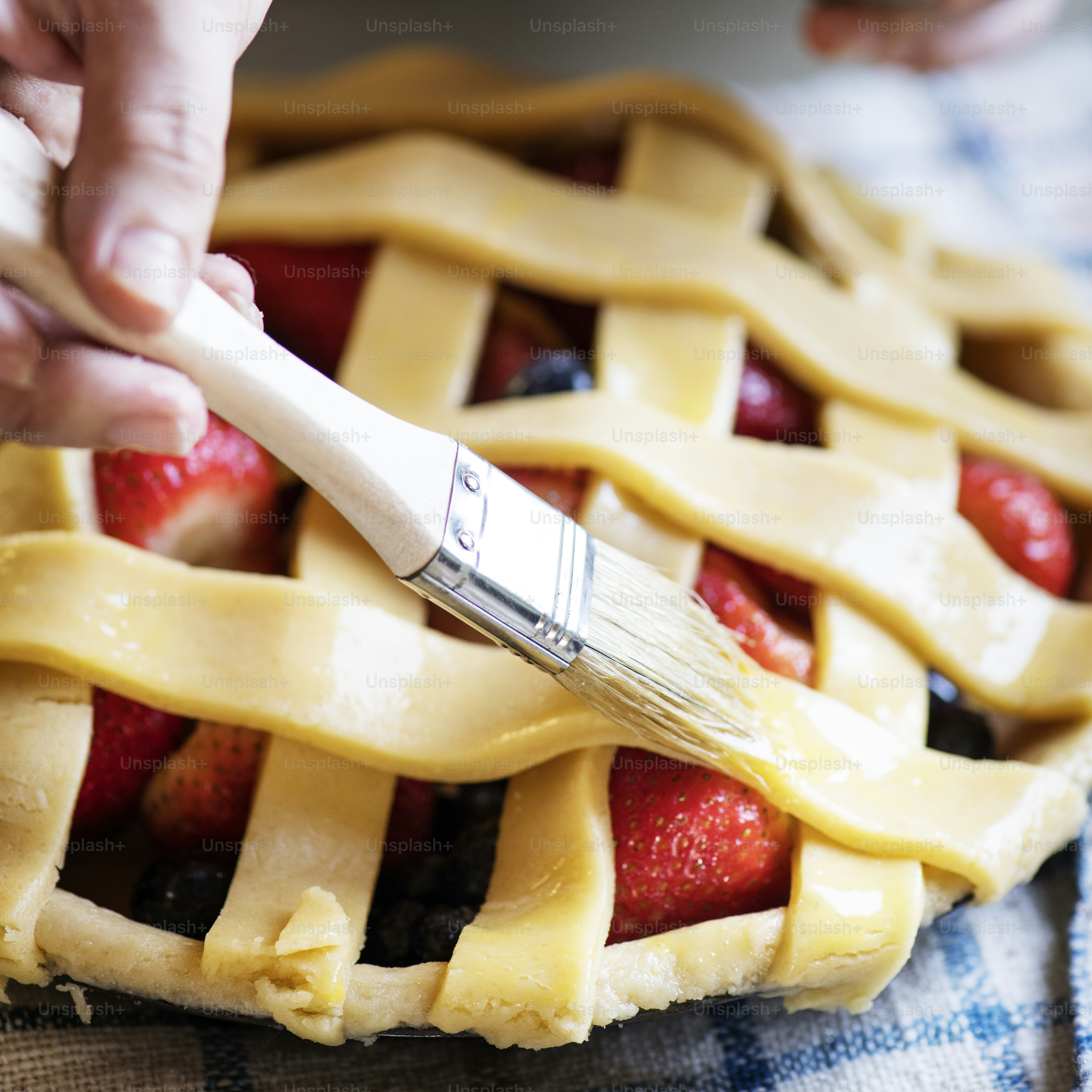 A person baking fruit pie food photography recipe idea