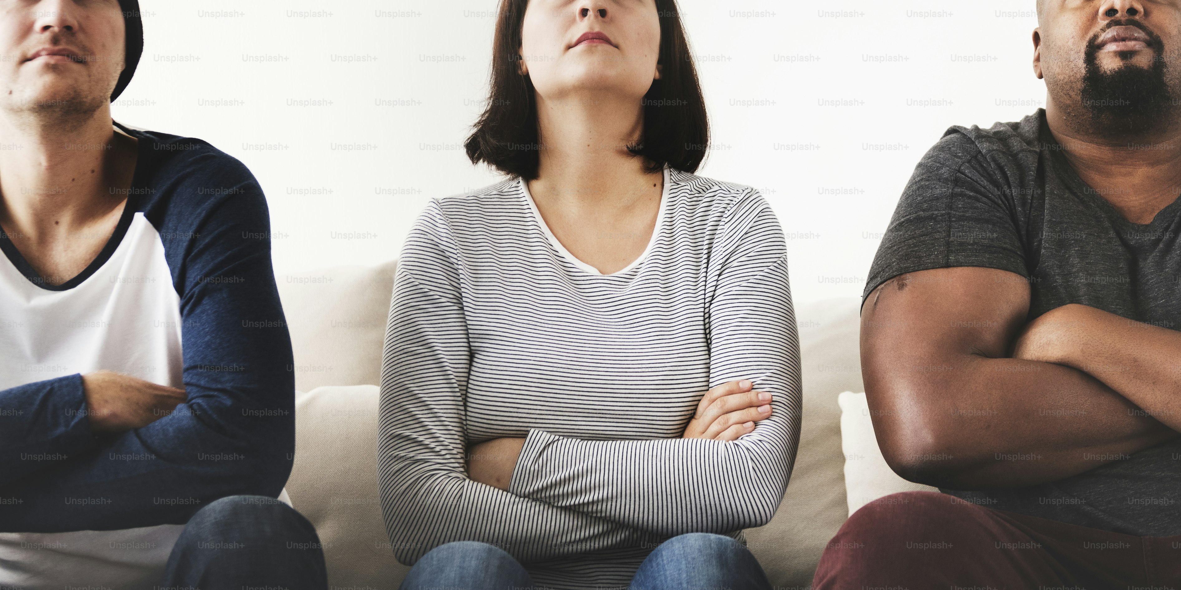 Group of diverse friends sitting on couch