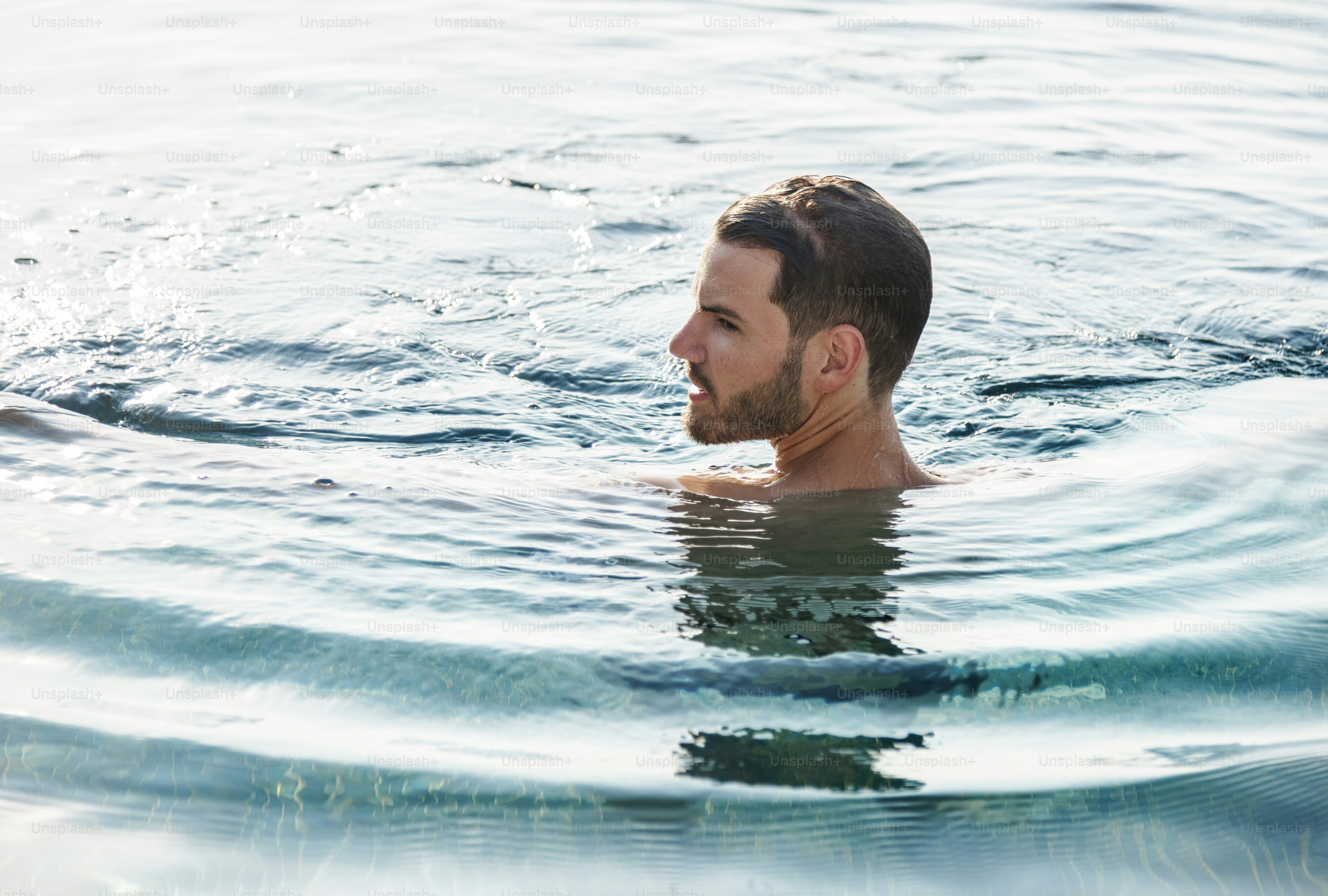 A man in the pool photo – Beach Image on Unsplash