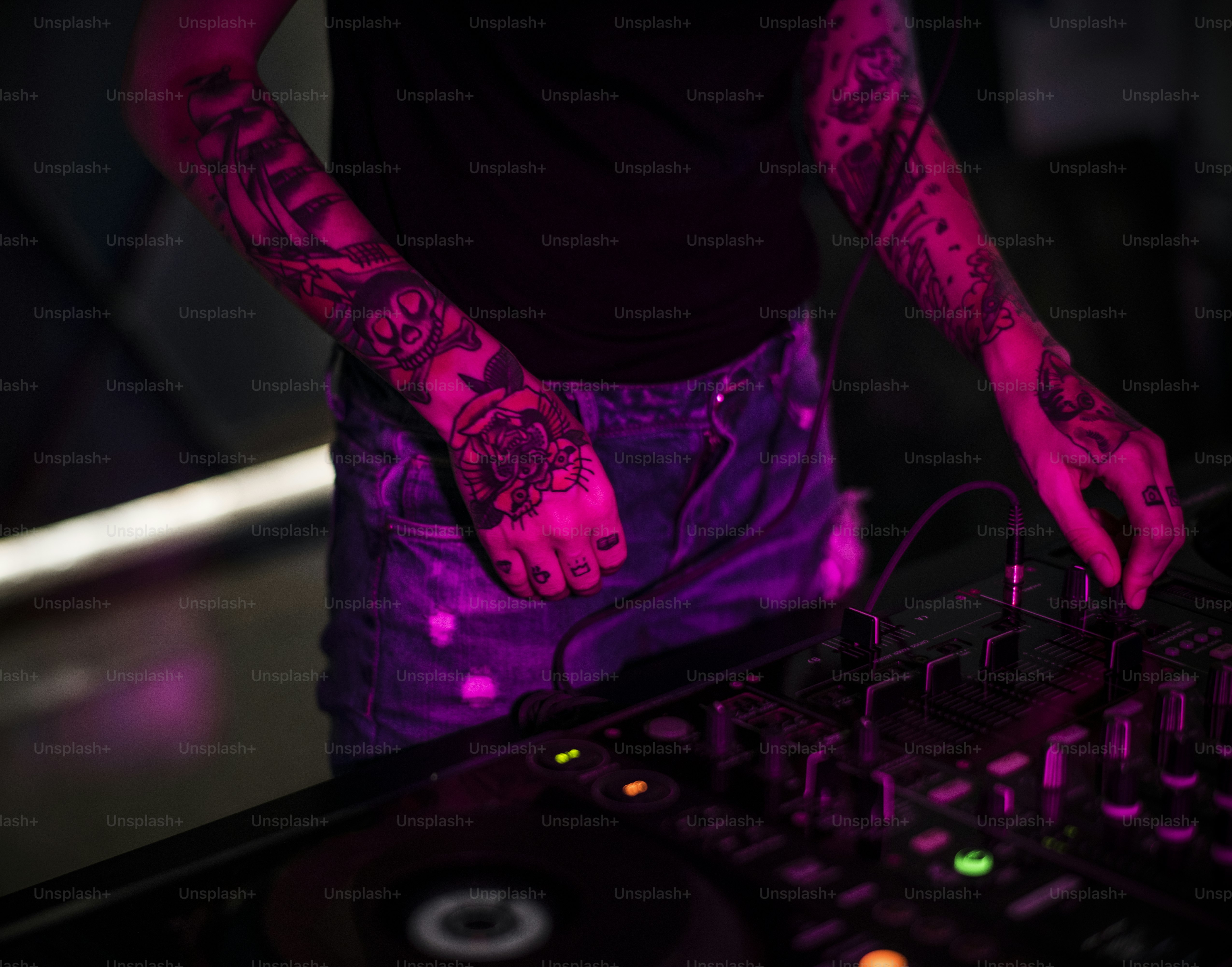 Hand on a sound mixer station