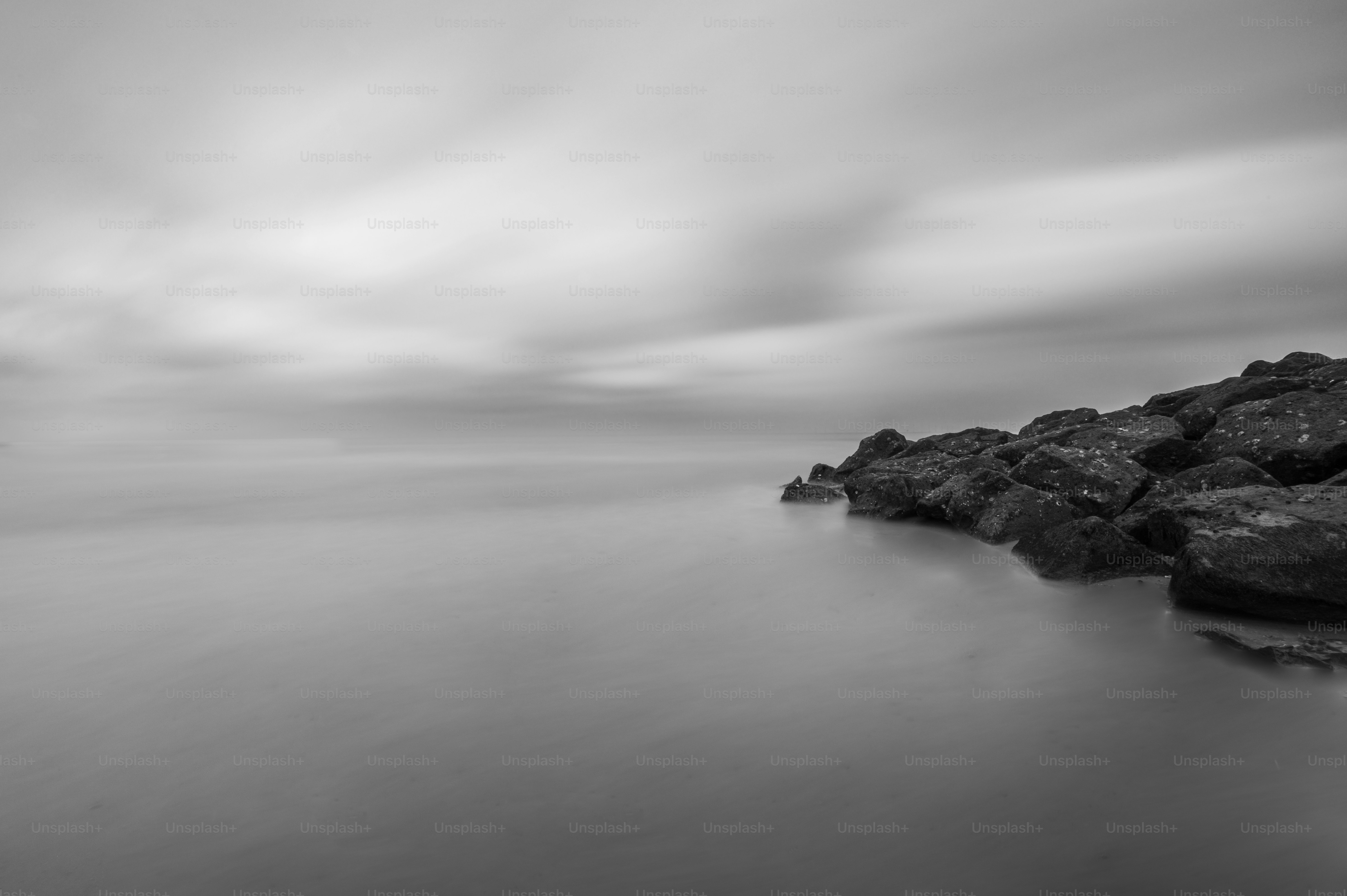 A black and white photo of a body of water